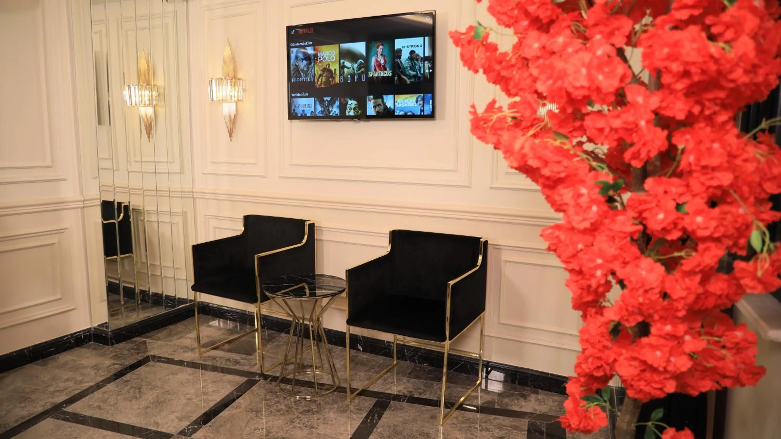 Seating area in OMMA HOTEL