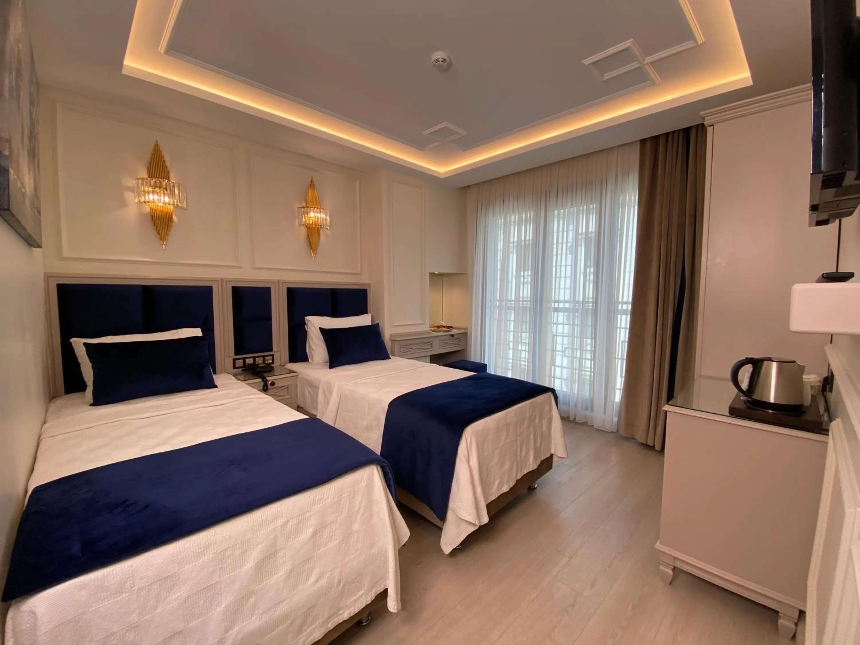 Photo of the whole room, Bed in OMMA HOTEL