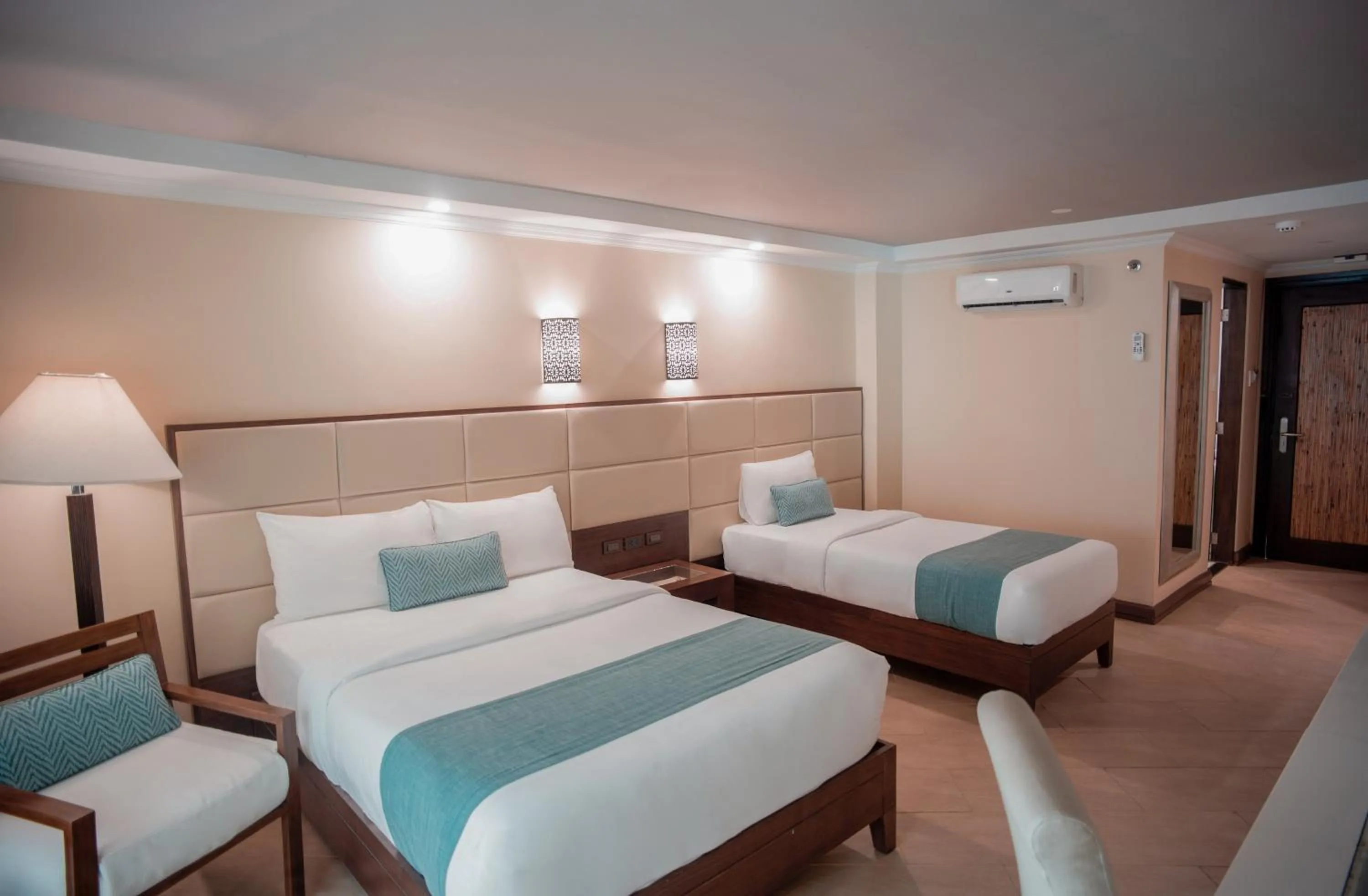 Photo of the whole room, Bed in Boracay Mandarin Island Hotel