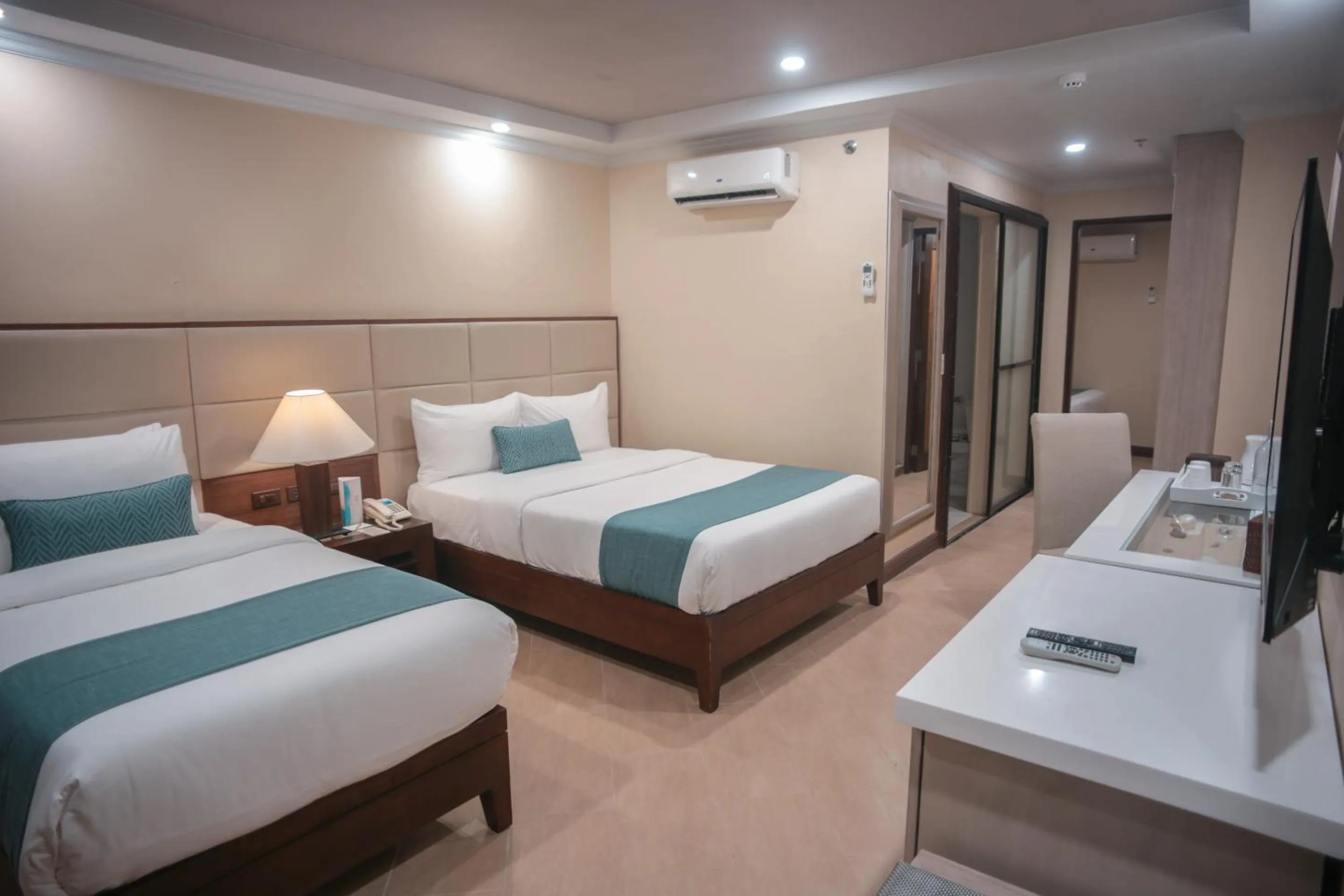 Photo of the whole room, Bed in Boracay Mandarin Island Hotel