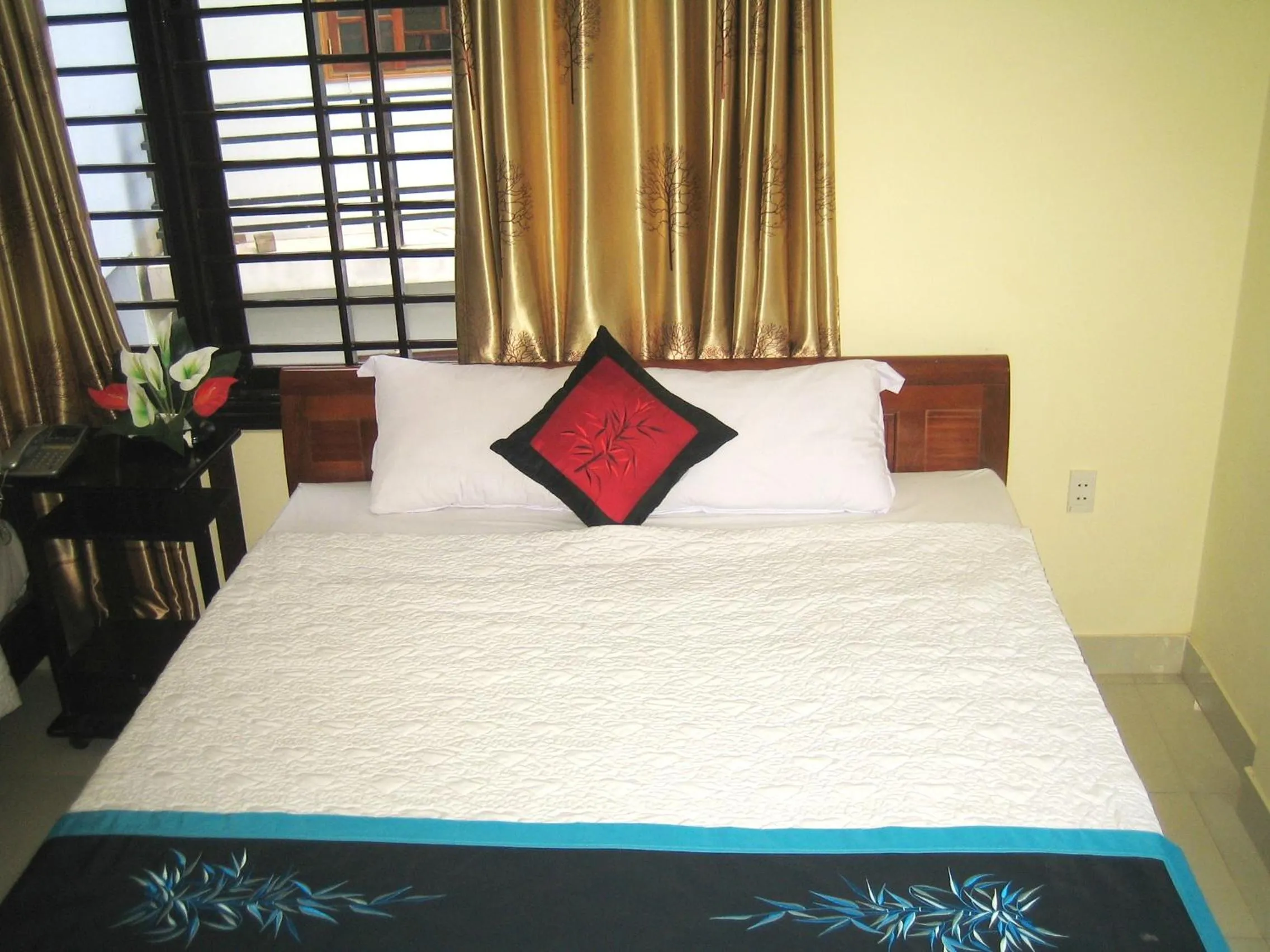 Bed in Champa Hue Hotel
