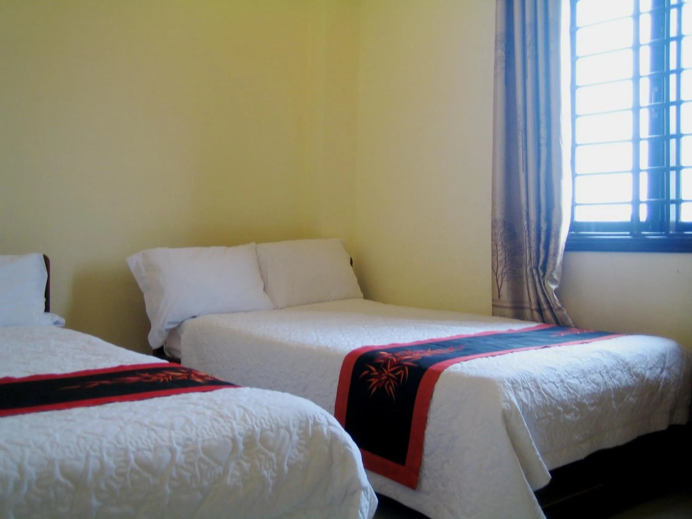 Bed in Champa Hue Hotel