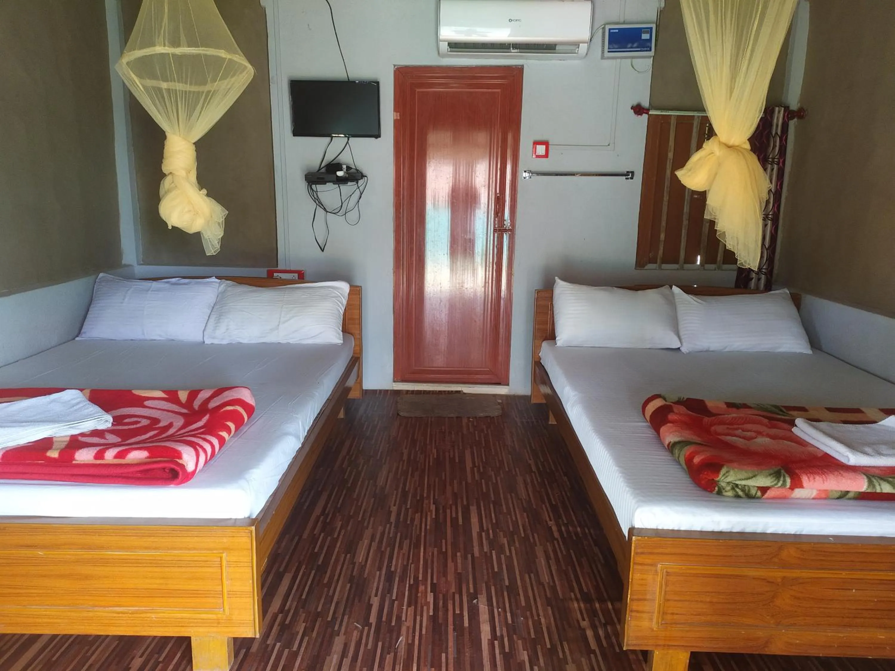 Bed in sundarban jungle mahal resort