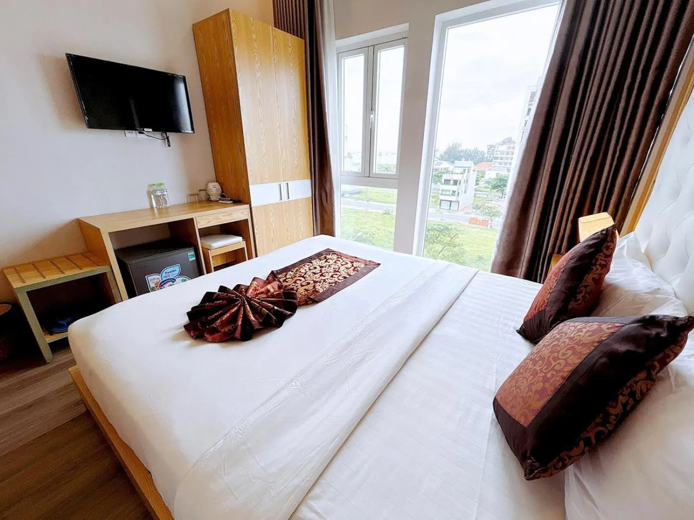 Bed in EMERALD OCEAN HOTEL