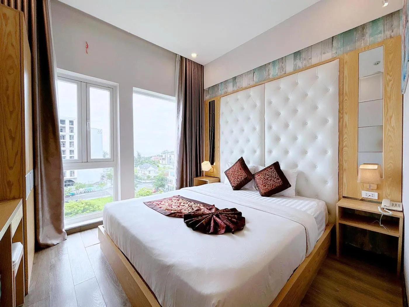 Bed in EMERALD OCEAN HOTEL