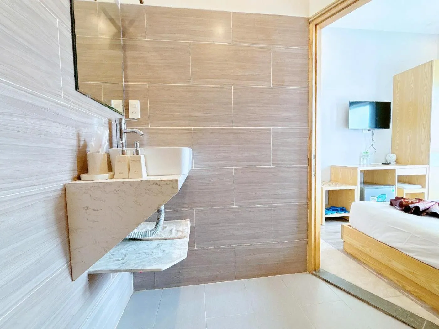 Bed in EMERALD OCEAN HOTEL