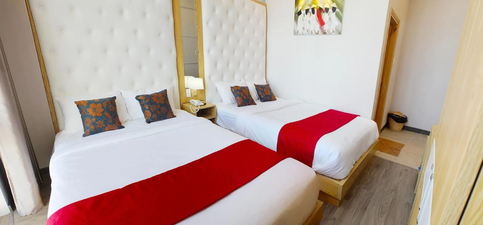 Bed in EMERALD OCEAN HOTEL