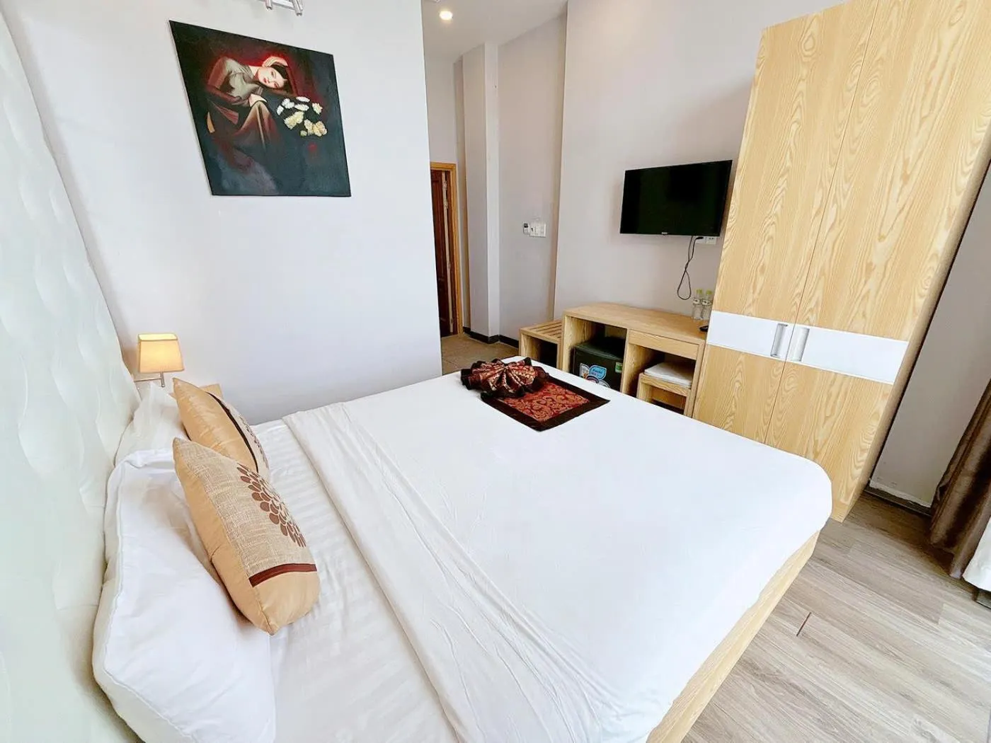 Bed in EMERALD OCEAN HOTEL