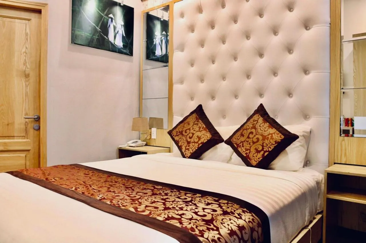 Bed in EMERALD OCEAN HOTEL