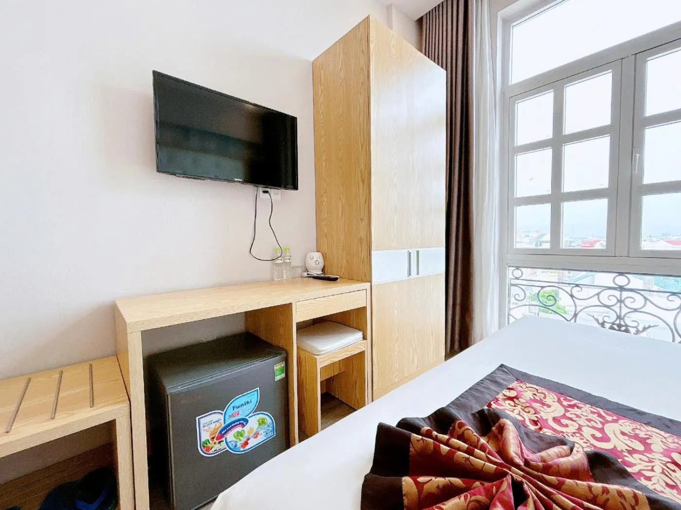 Bed in EMERALD OCEAN HOTEL