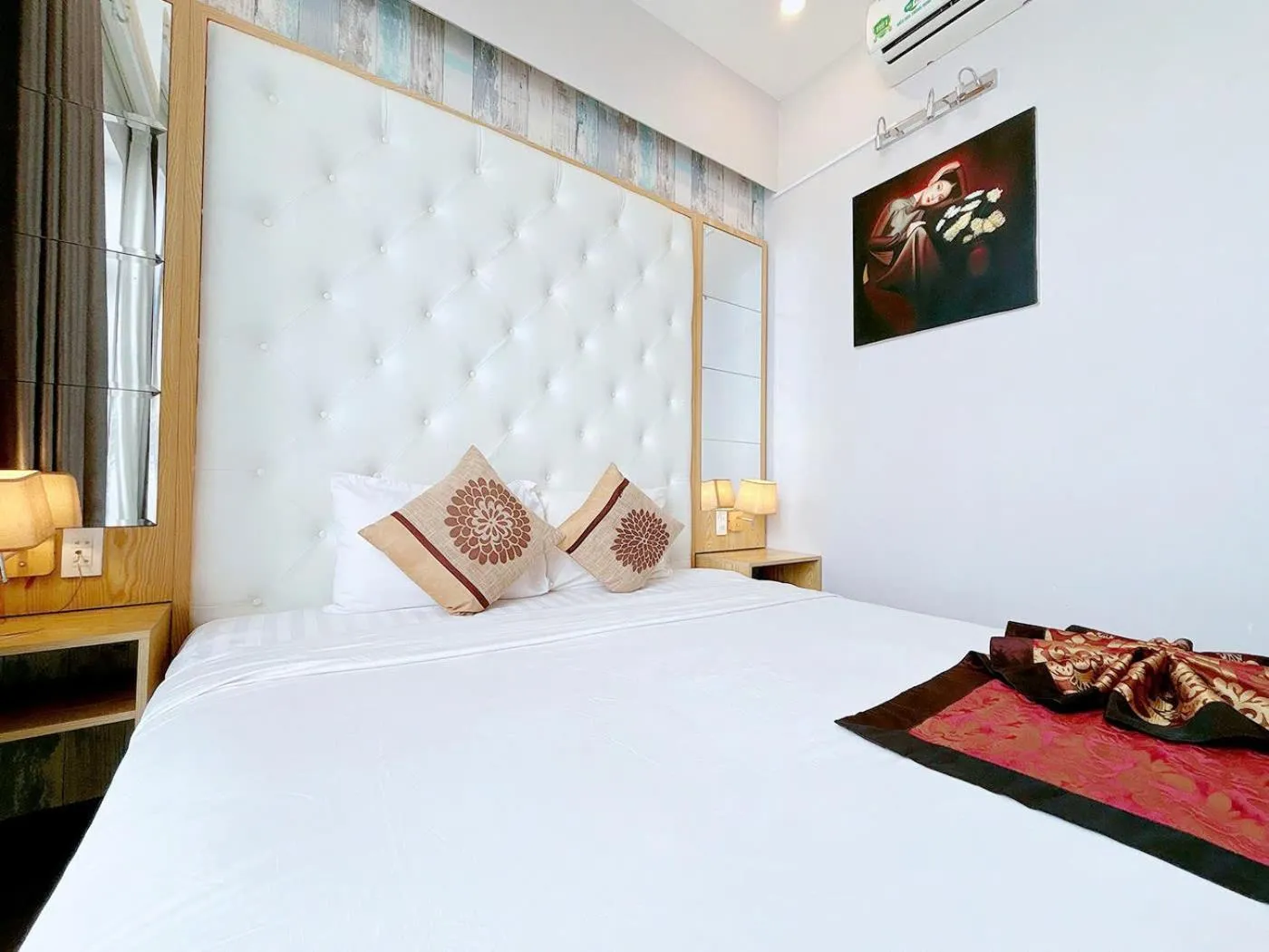 Bed in EMERALD OCEAN HOTEL