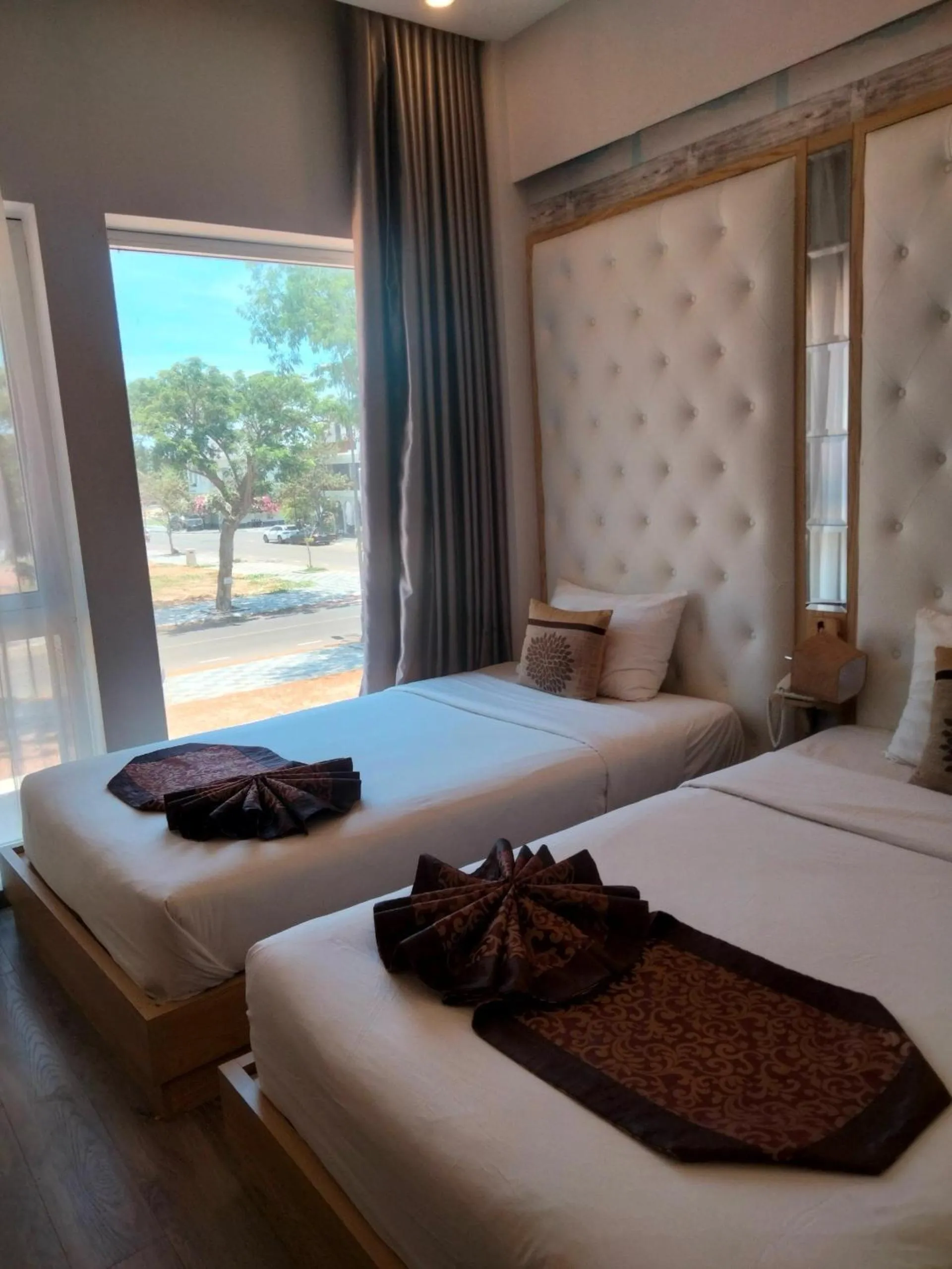 Bed in EMERALD OCEAN HOTEL