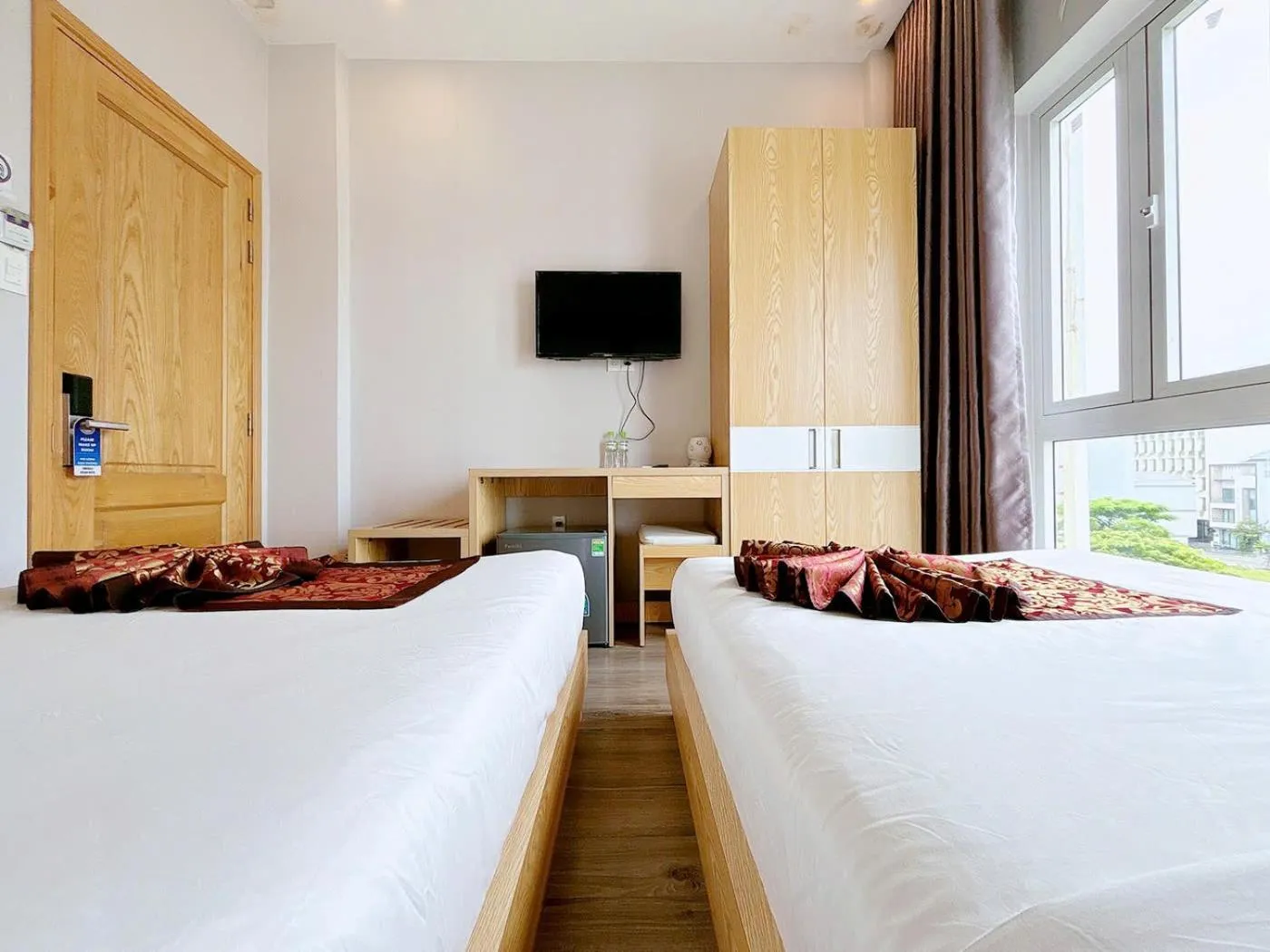 Bed in EMERALD OCEAN HOTEL