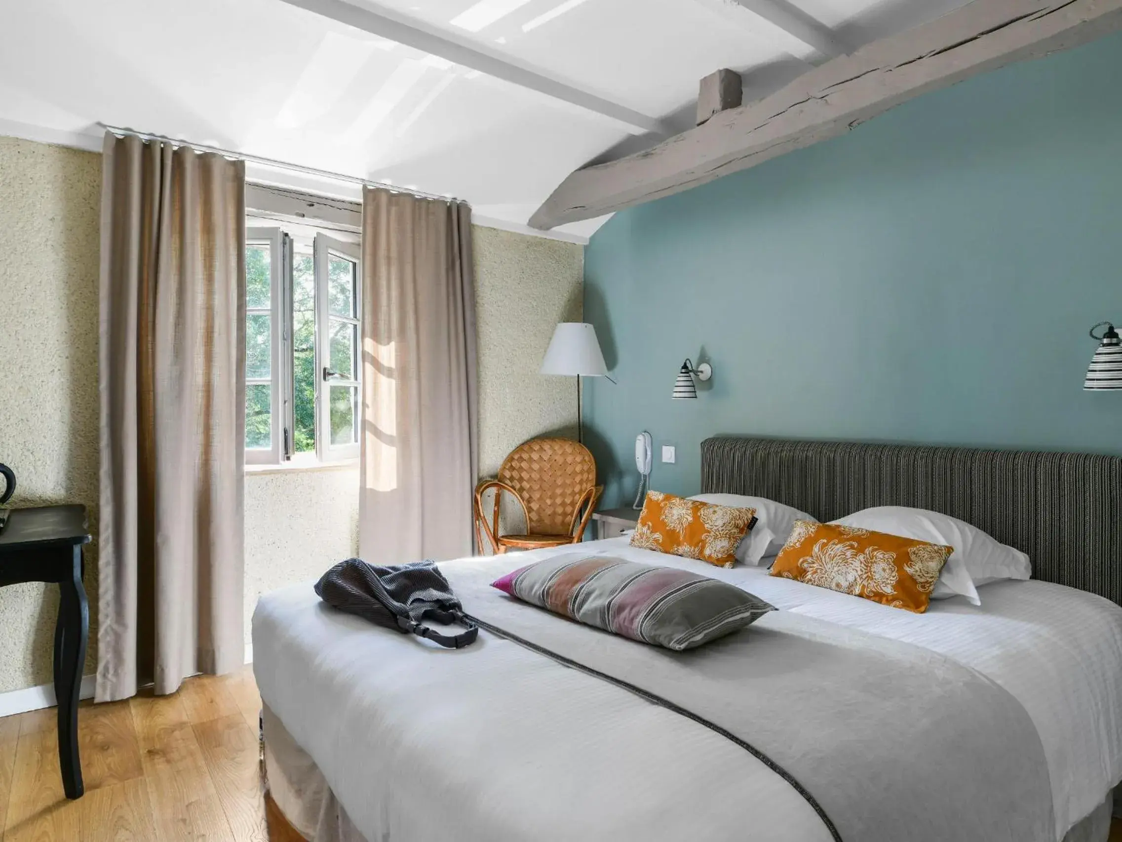 Bed in Logis Hôtel La Ferme de Flaran Bed in Logis Hôtel La Ferme de Flaran