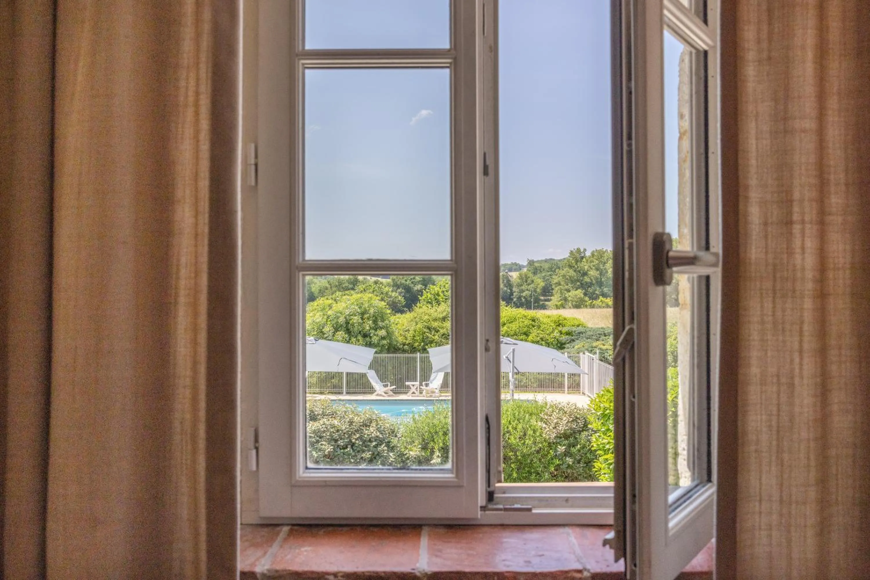 Garden in Logis Hôtel La Ferme de Flaran