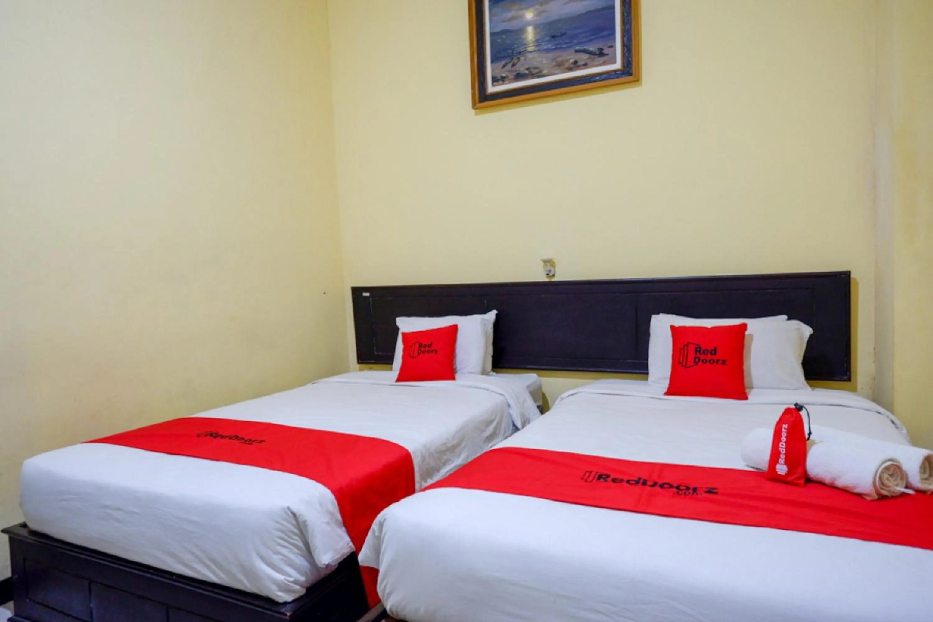 Bed in RedDoorz near Citraland Waterpark Kendari