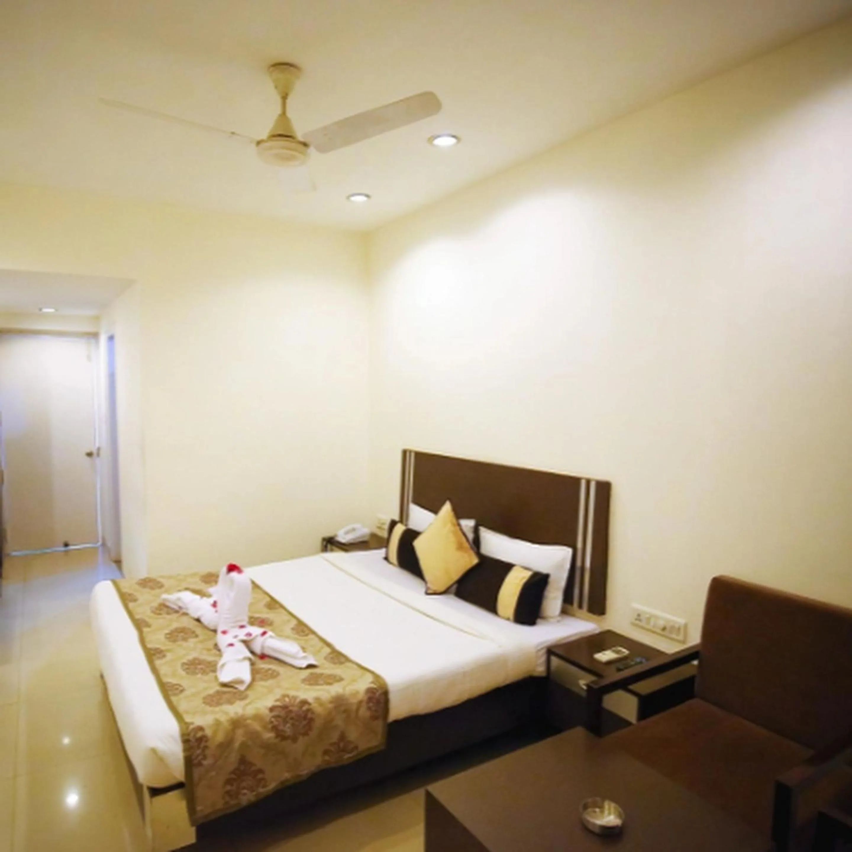 Bed in Regency Square Hotel