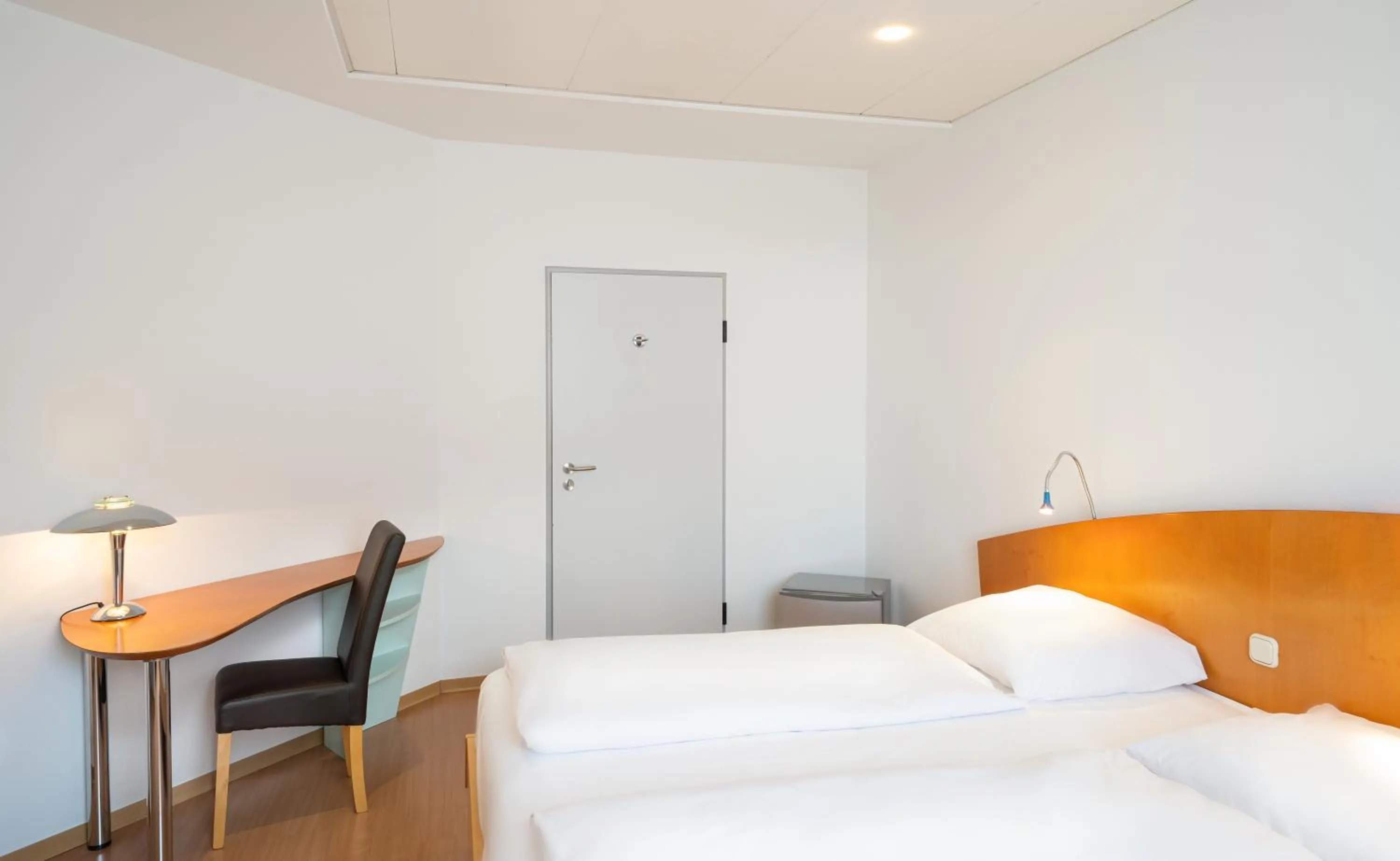 Bed in Mainstreet Hotel