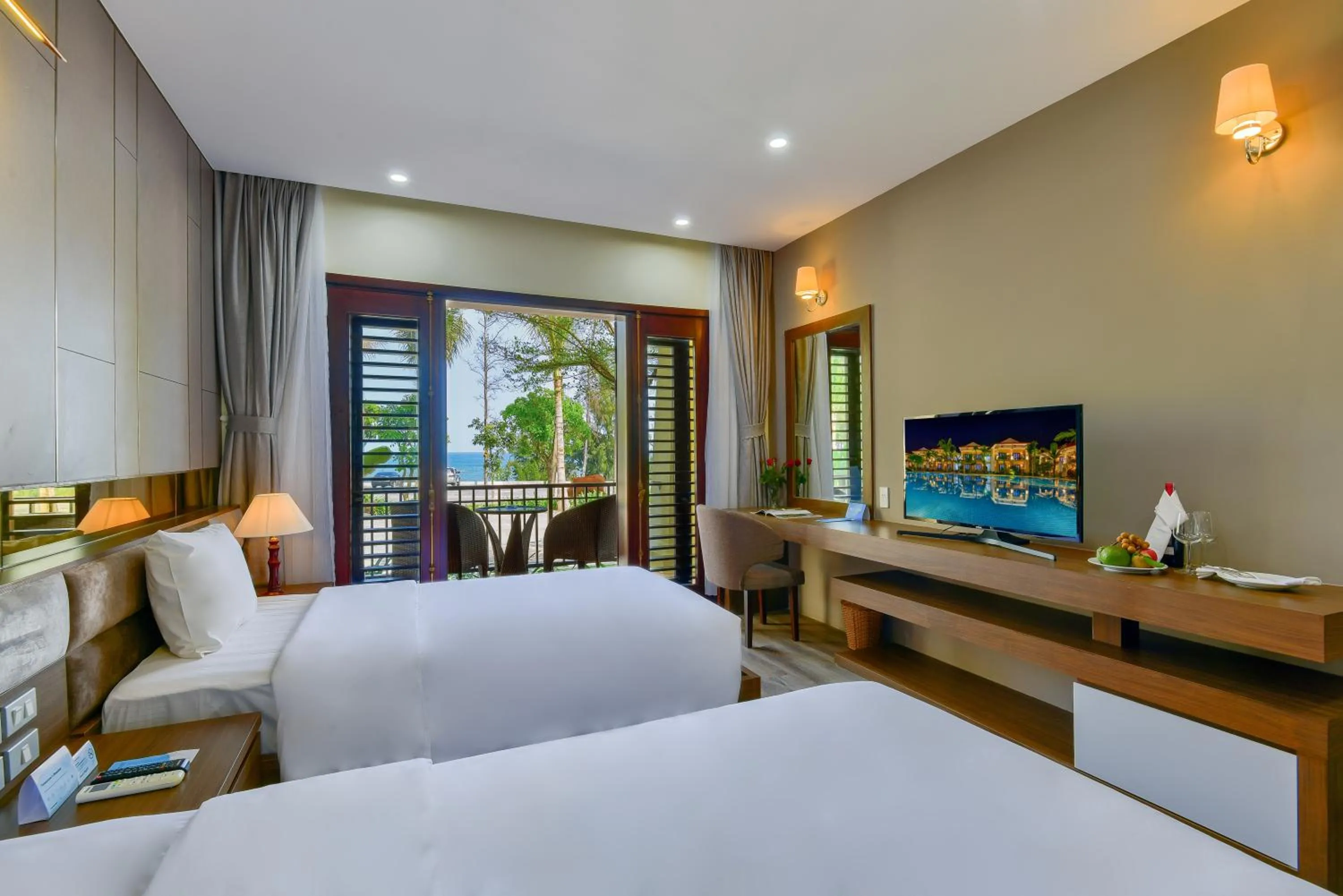 Photo of the whole room, Bed in MANLI Resort Quảng Bình
