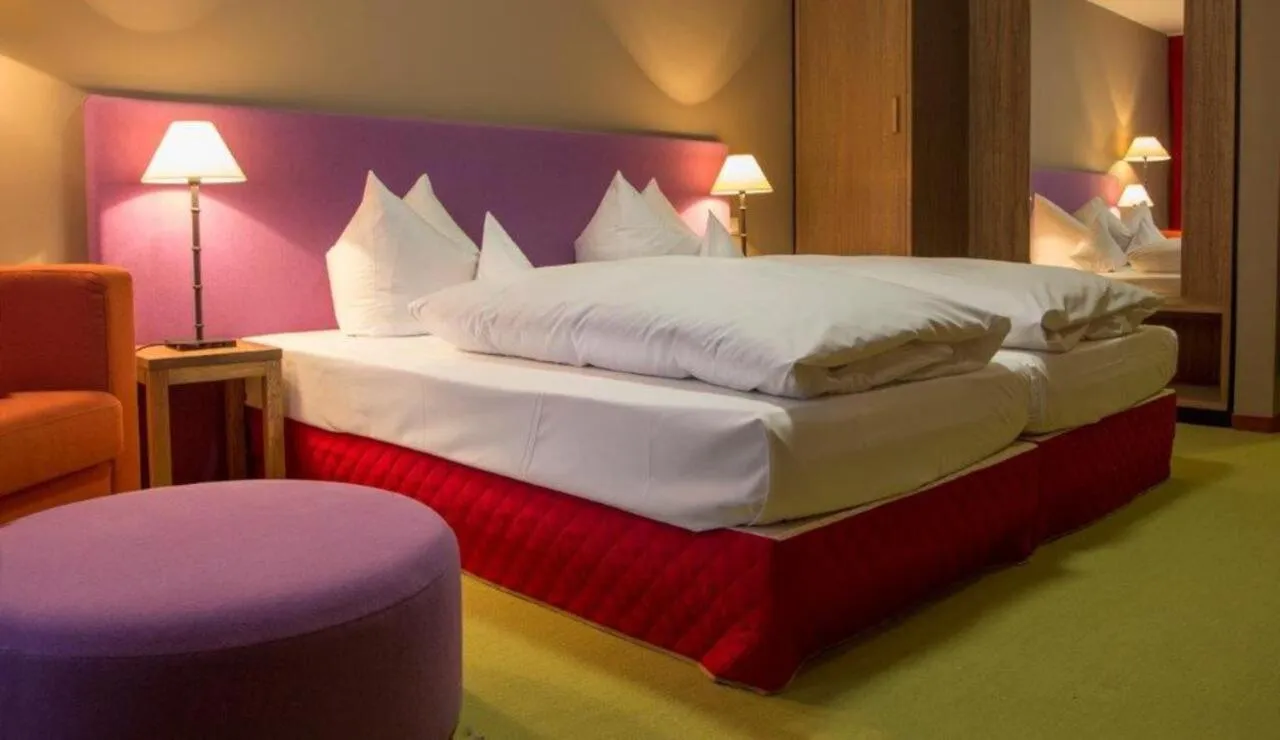 Photo of the whole room, Bed in Schurwald Hotel
