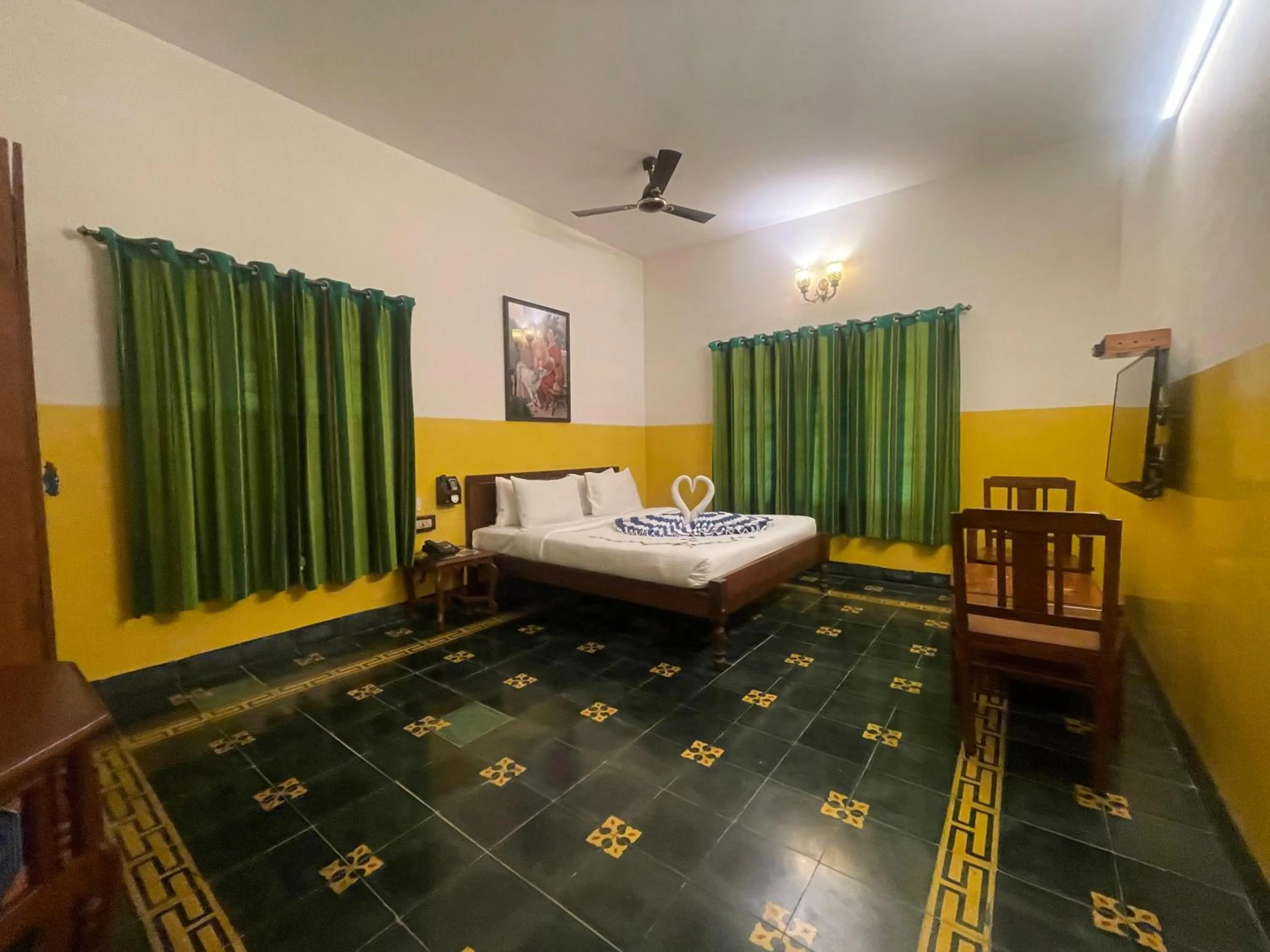 Bed in Marutham Village Resort