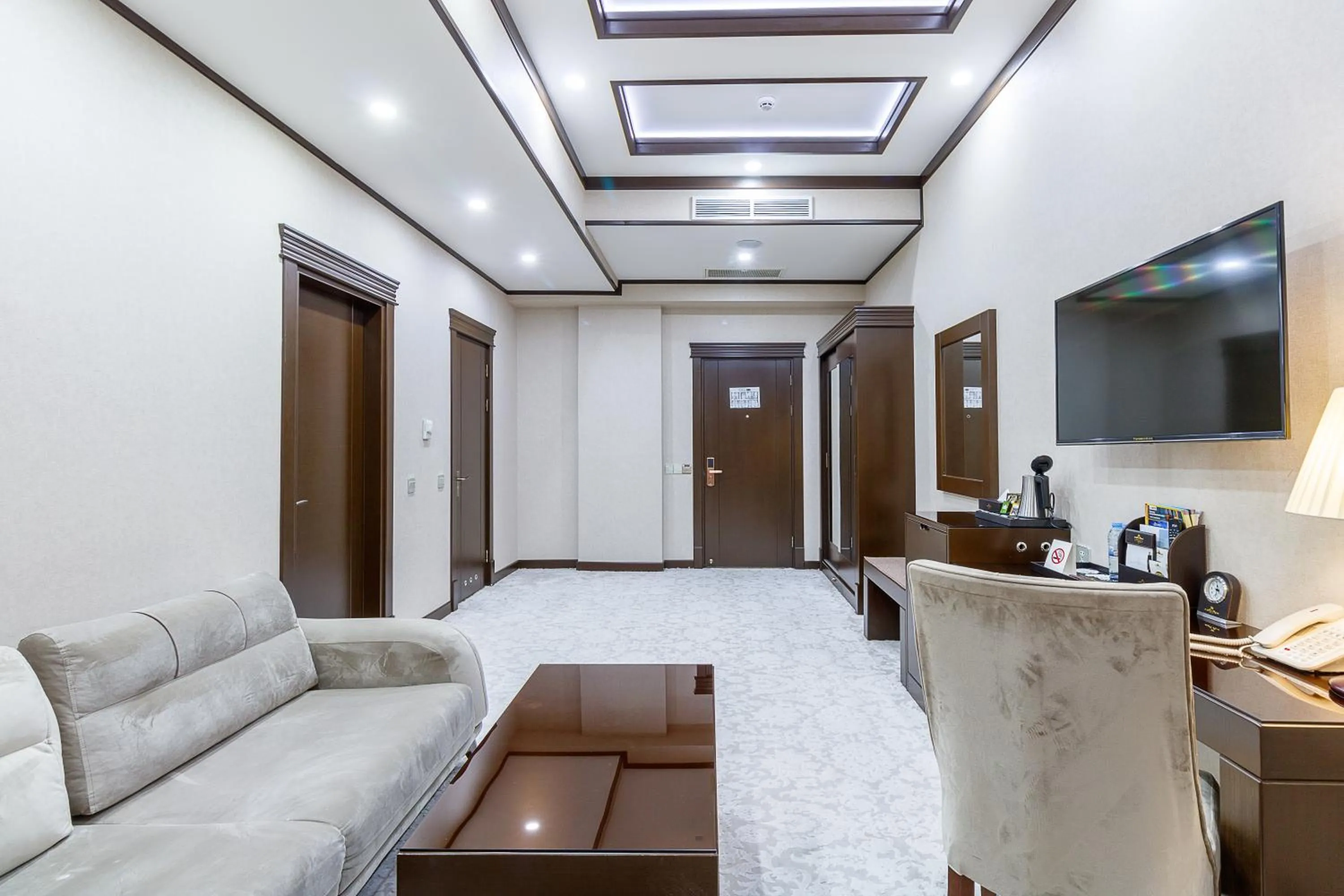 Living room in Qushbegi Plaza Hotel