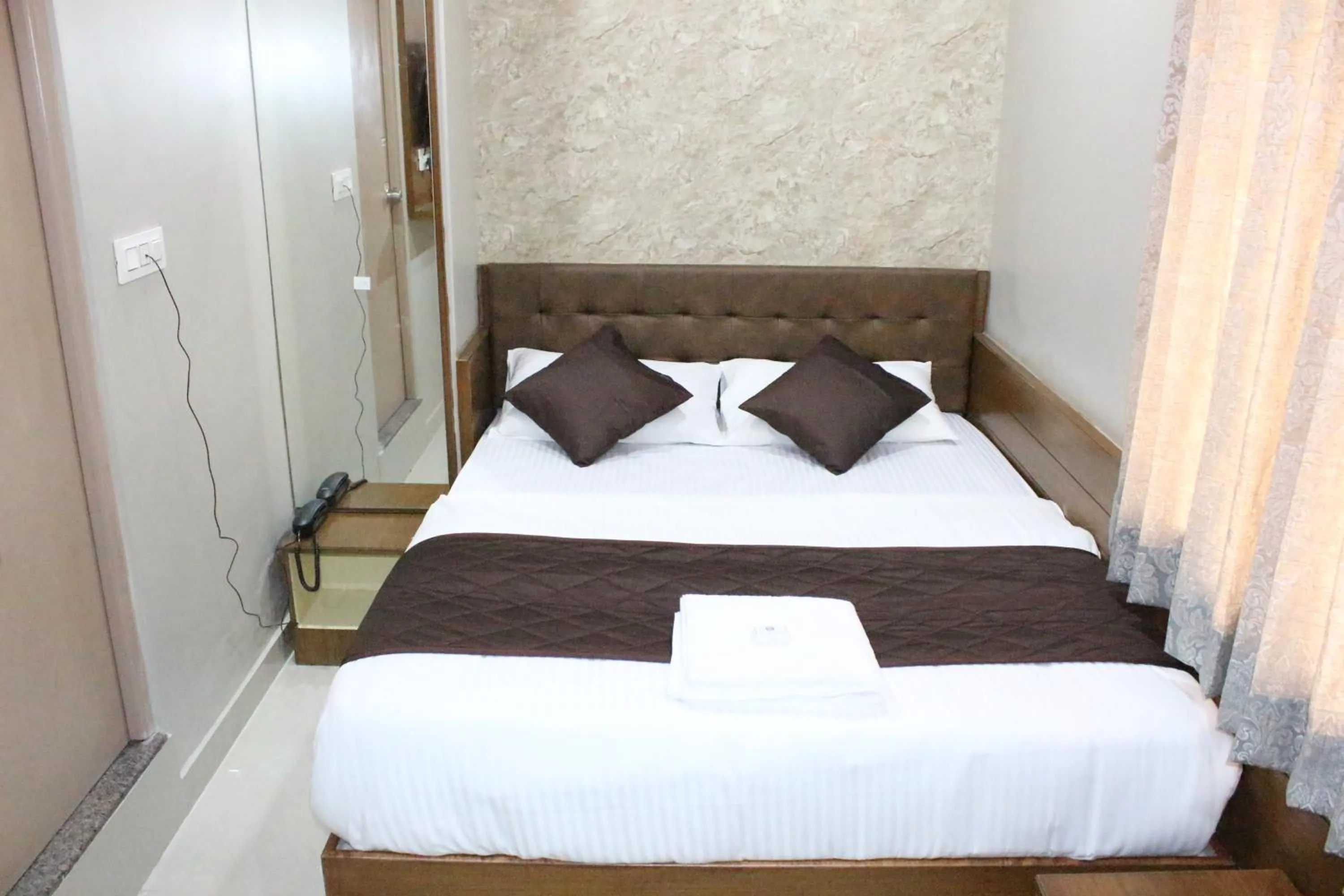 Bed in Olivia Inn And Suites