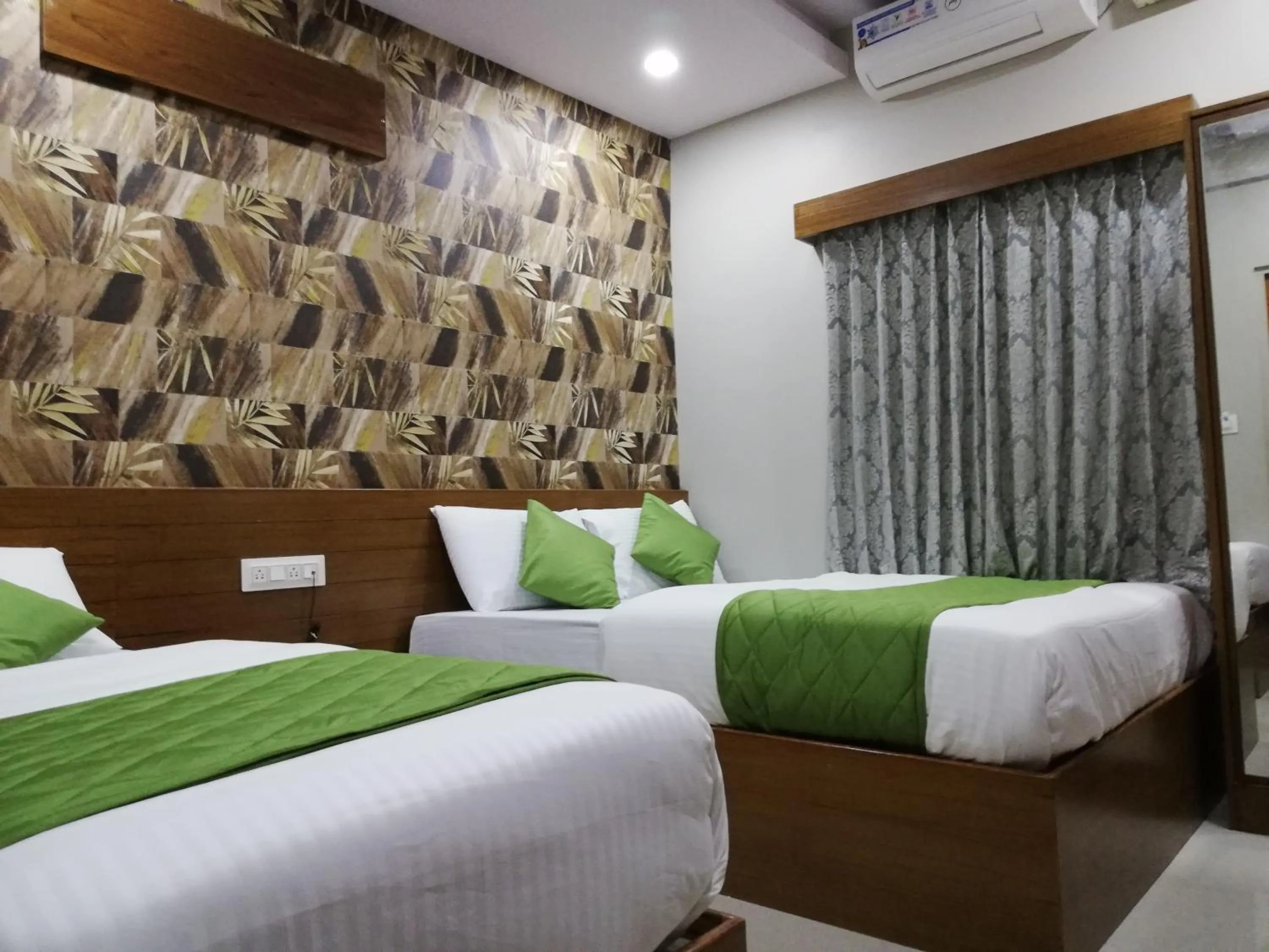 Bed in Olivia Inn And Suites