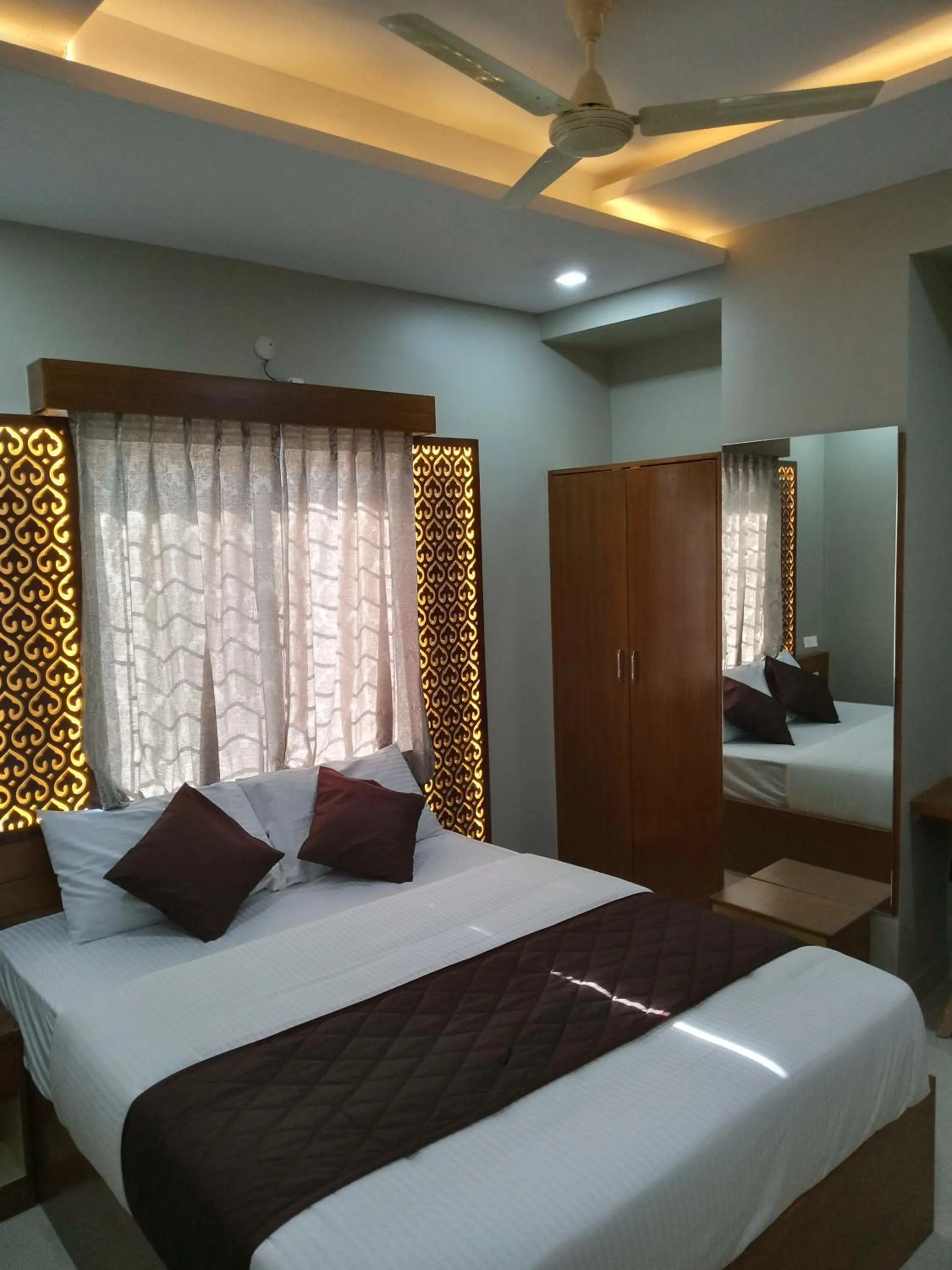 Bed in Olivia Inn And Suites