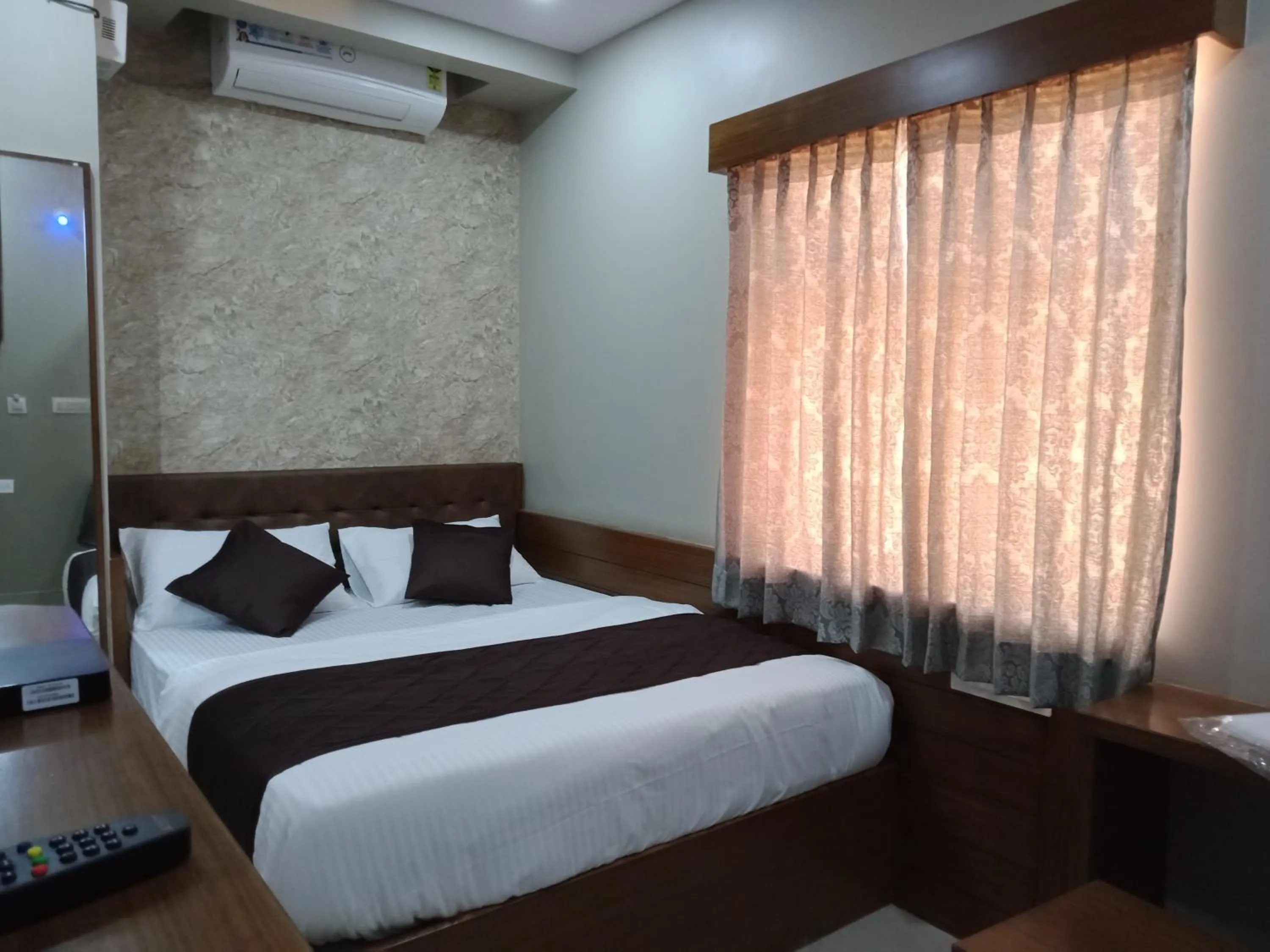 Bed in Olivia Inn And Suites