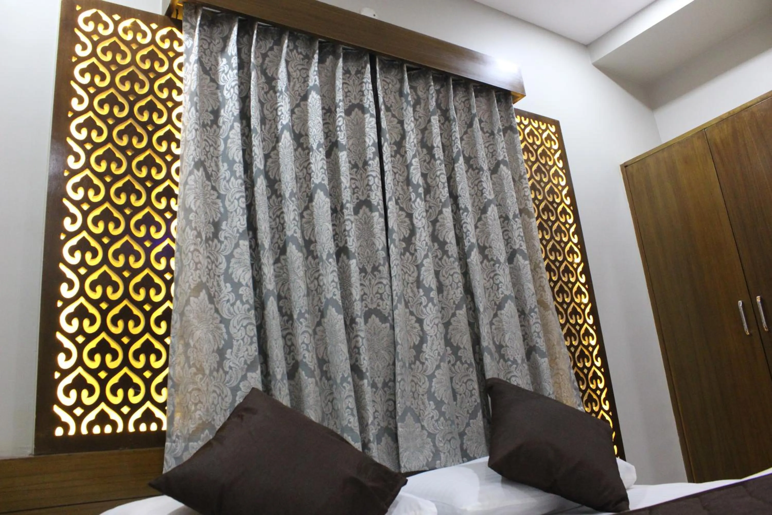 Bed in Olivia Inn And Suites