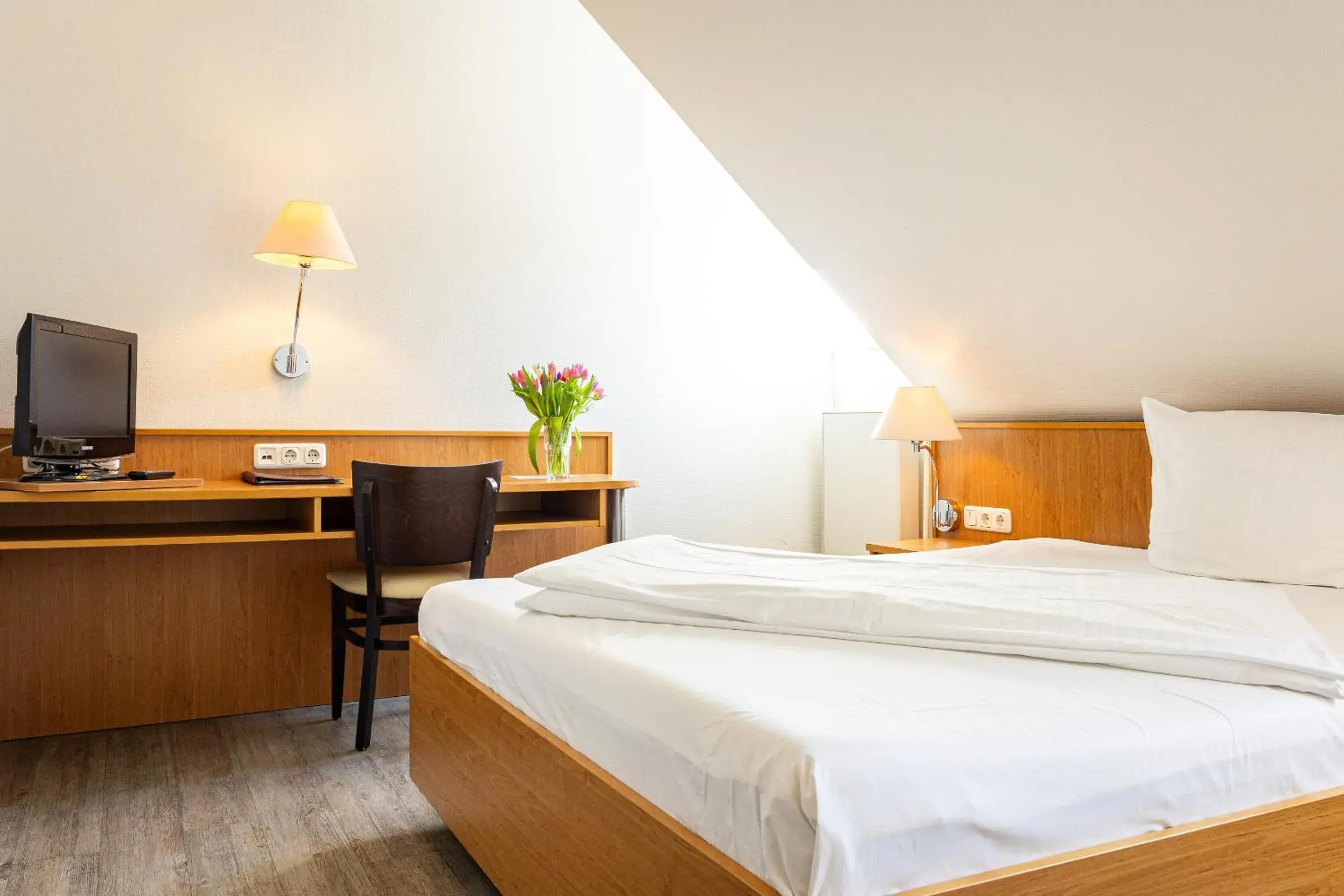 Bed in Hotel Aulmann Bed in Hotel Aulmann