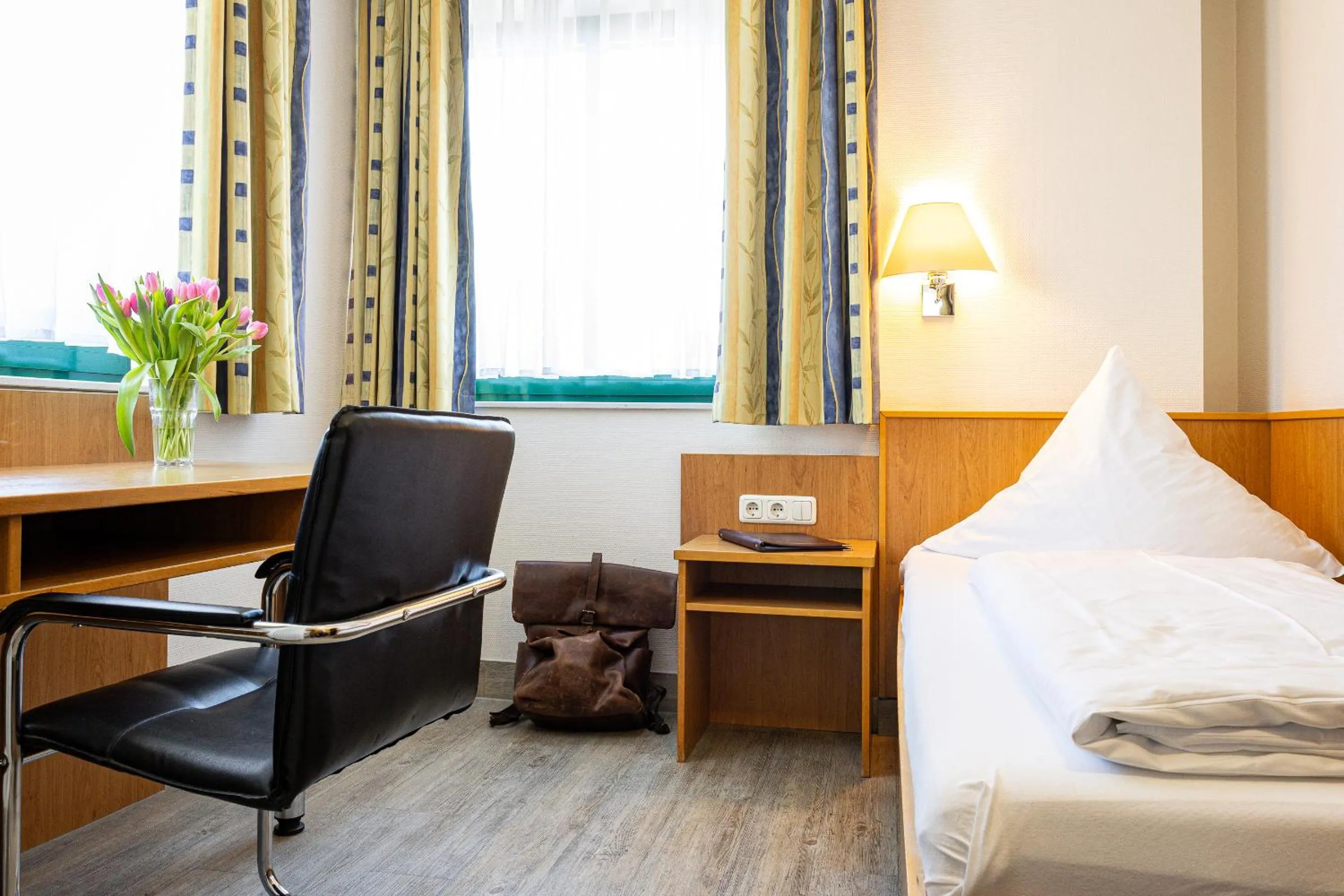 Seating area, Bed in Hotel Aulmann