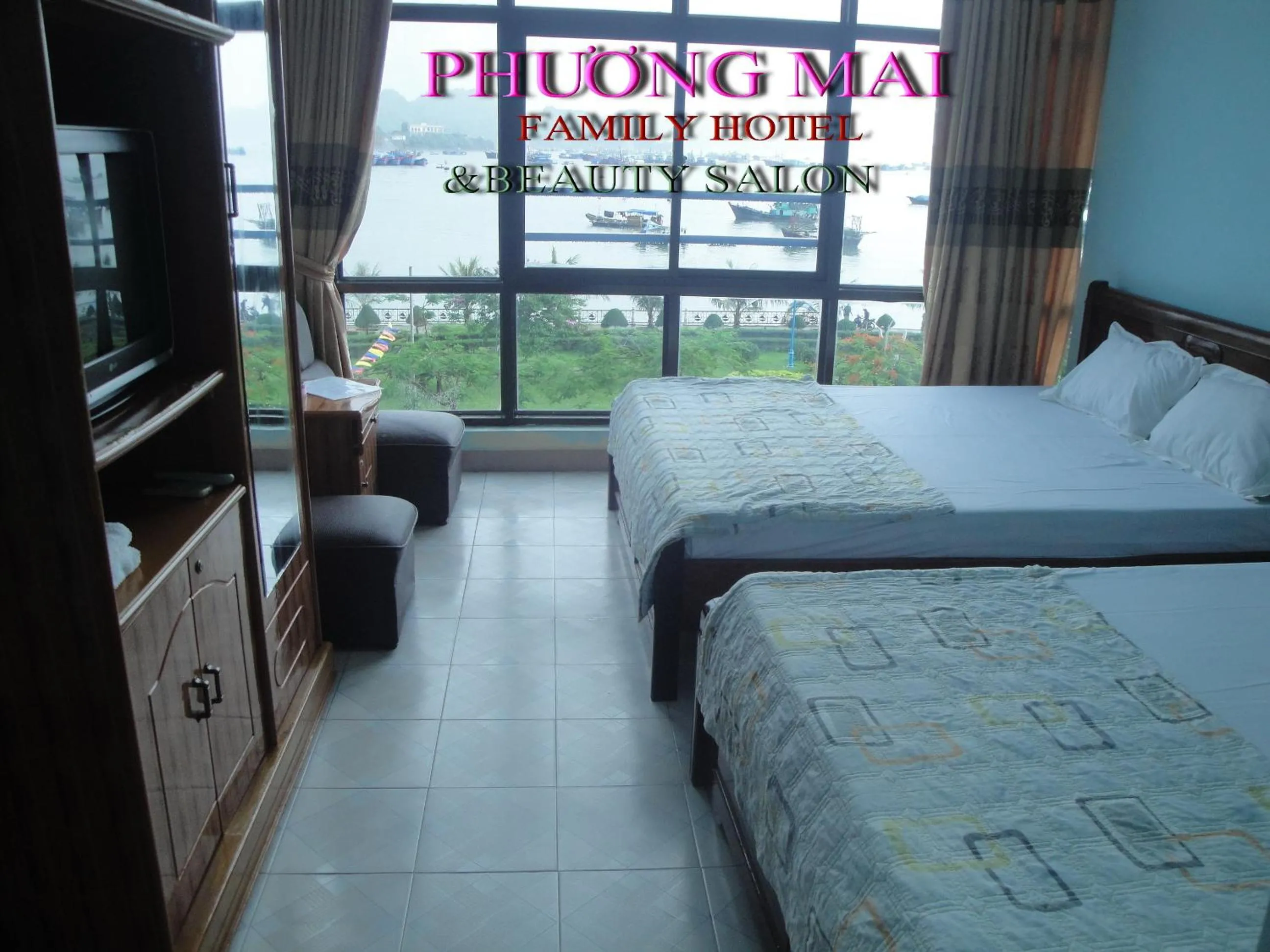Text overlay, Bed in Phuong Mai Family Hotel