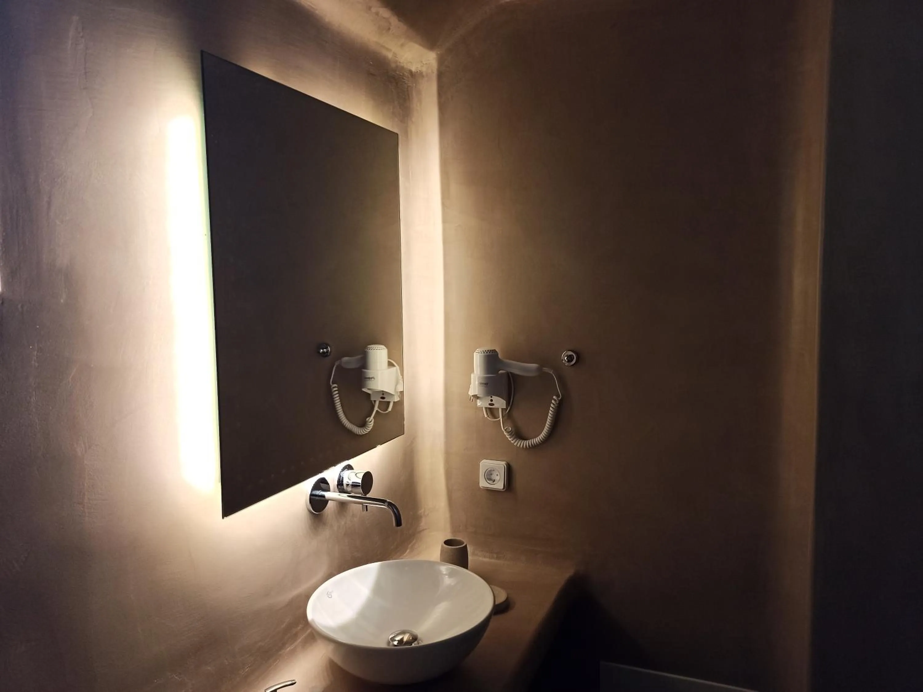 Bathroom in Amphitrite Suites Santorini