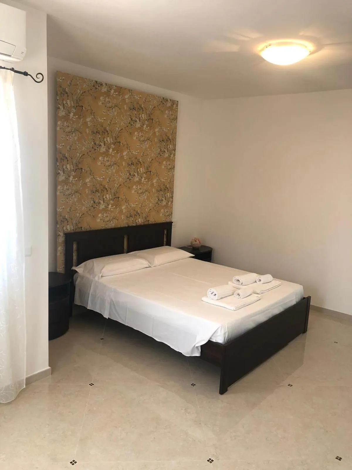 Bed in Villa Carmen Resort