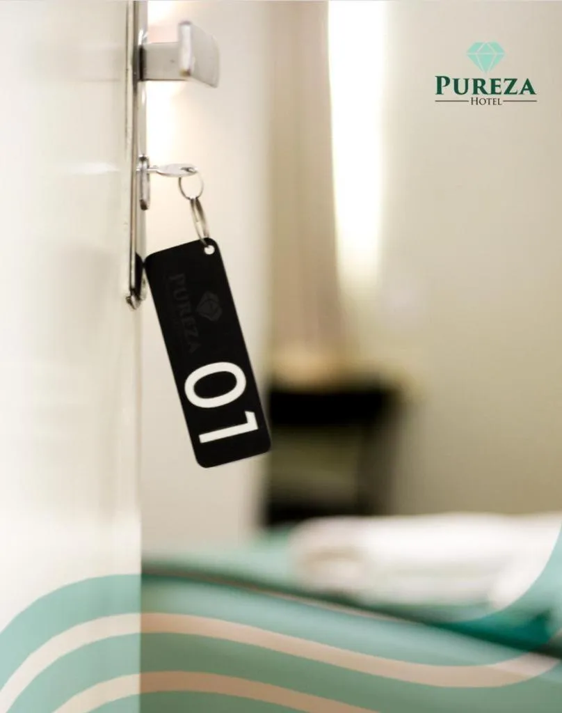 Bed in Pureza Hotel