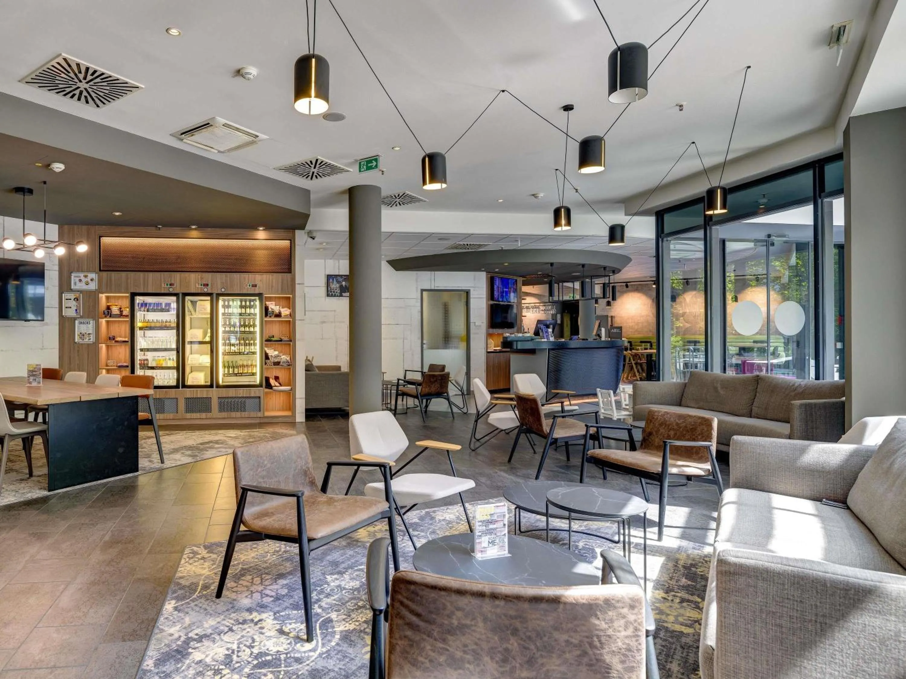 Lounge or bar in Novotel Suites München Parkstadt Schwabing