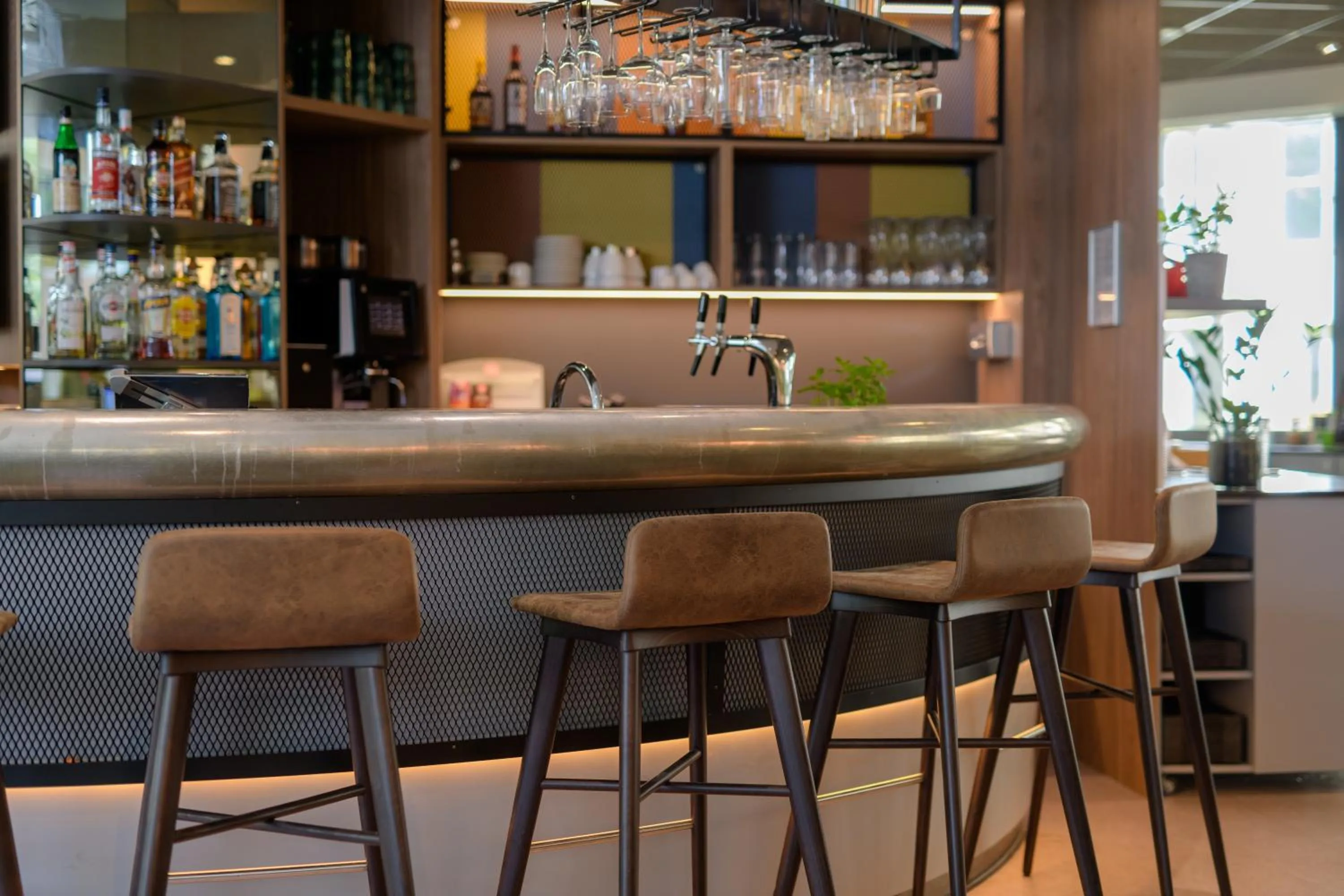 Lounge or bar in Novotel Suites München Parkstadt Schwabing