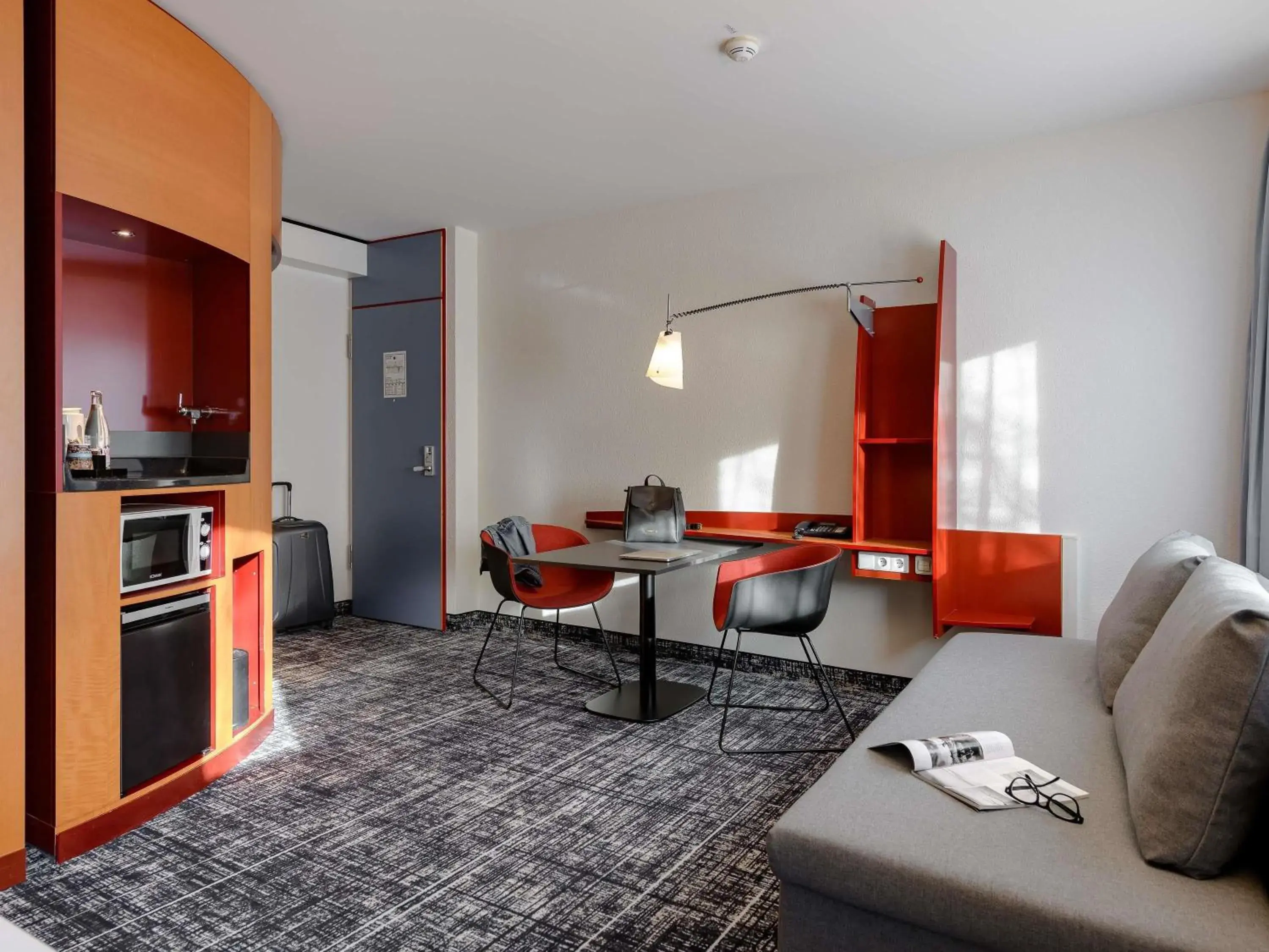 Bedroom in Novotel Suites München Parkstadt Schwabing Bedroom in Novotel Suites München Parkstadt Schwabing