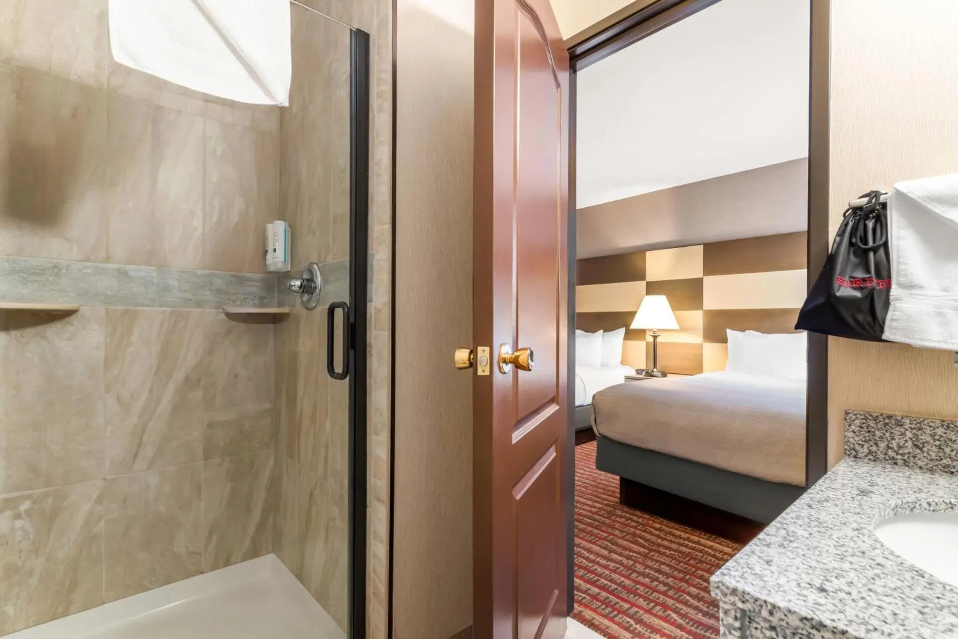 Bed in Quality Inn near Rocky Mountain National Park