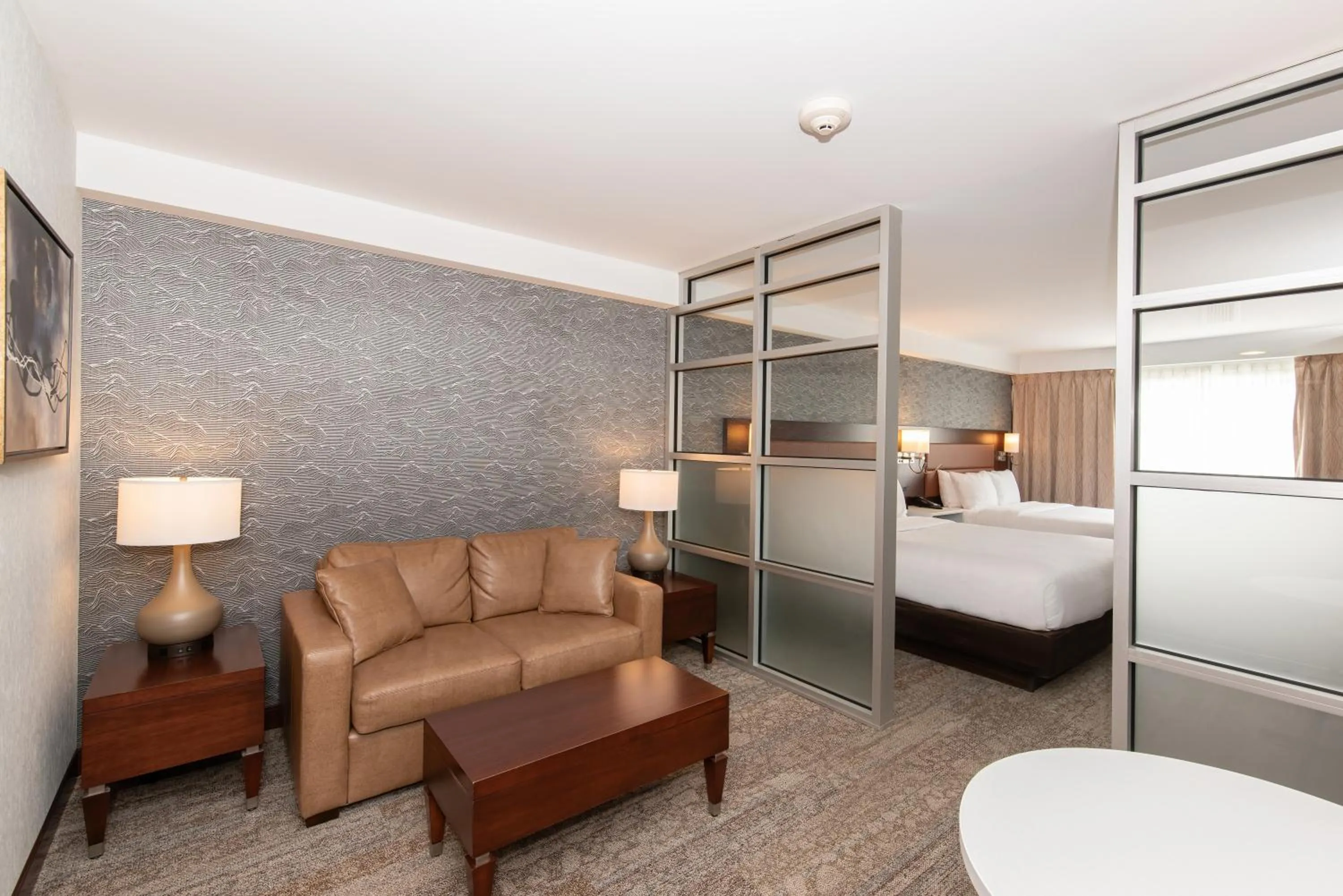 Seating area, Bed in Quality Inn & Suites