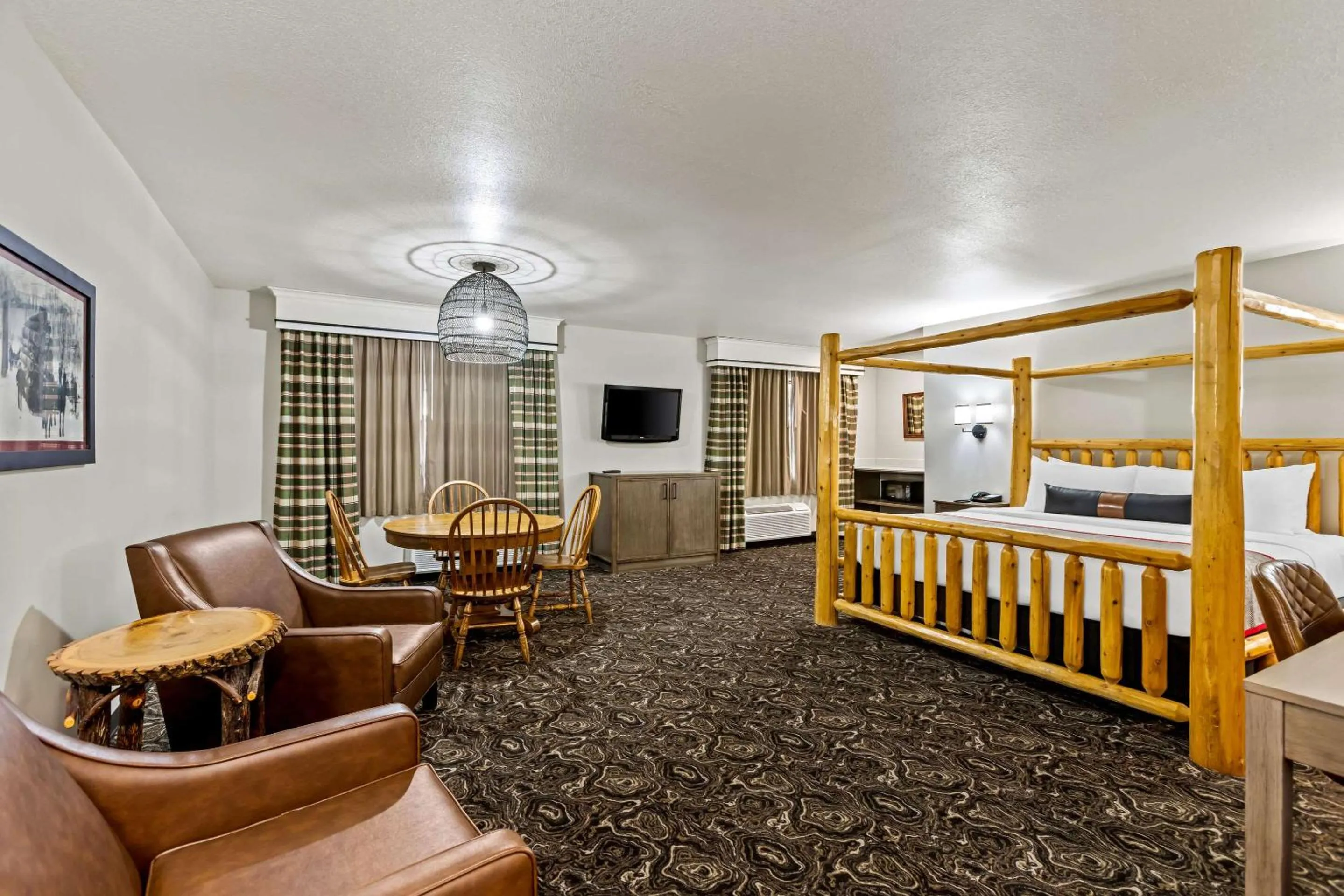 Bedroom in Lumber Jack Lodge, Ascend Hotel Collection