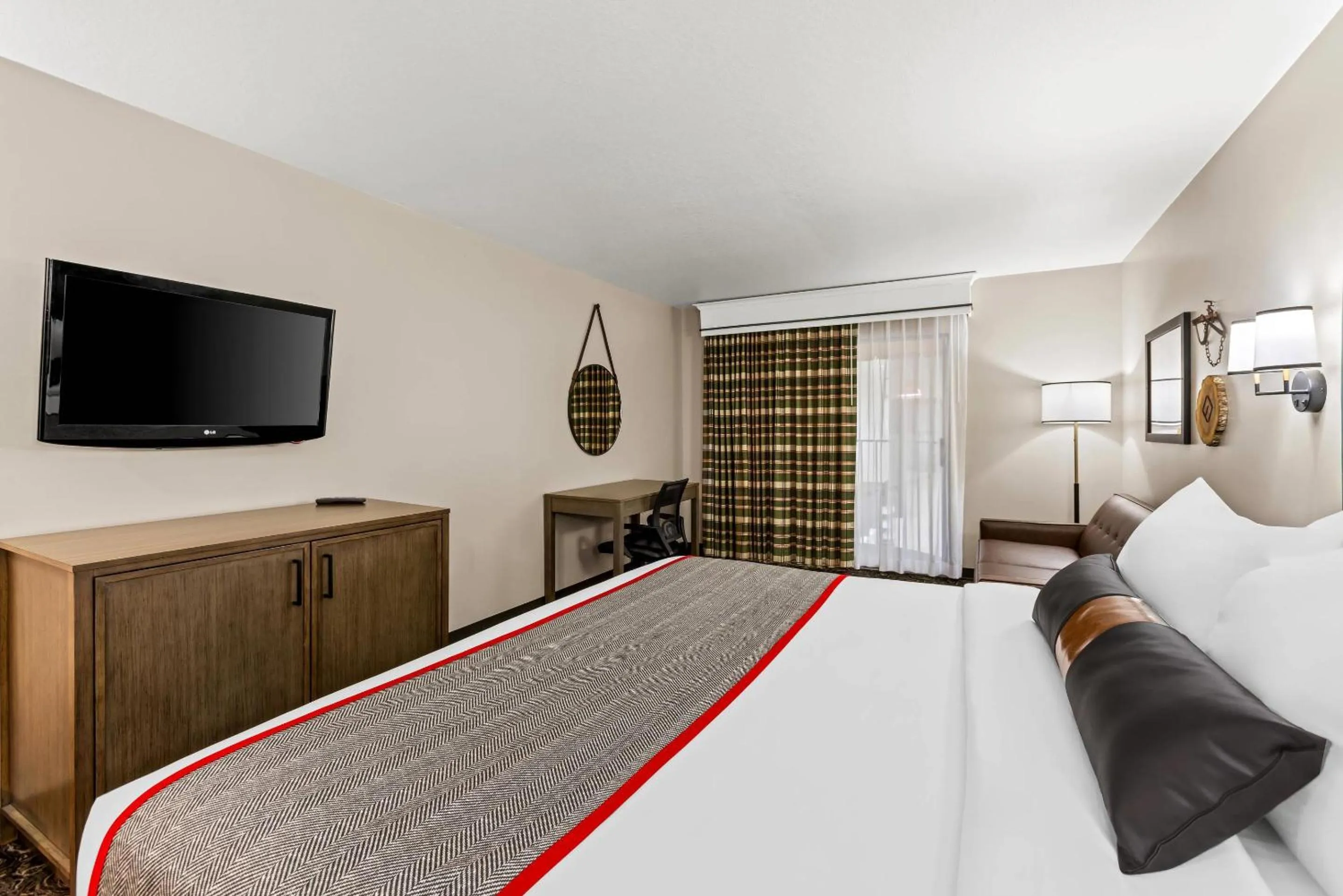 Bedroom, Bed in Lumber Jack Lodge, an Ascend Collection Hotel