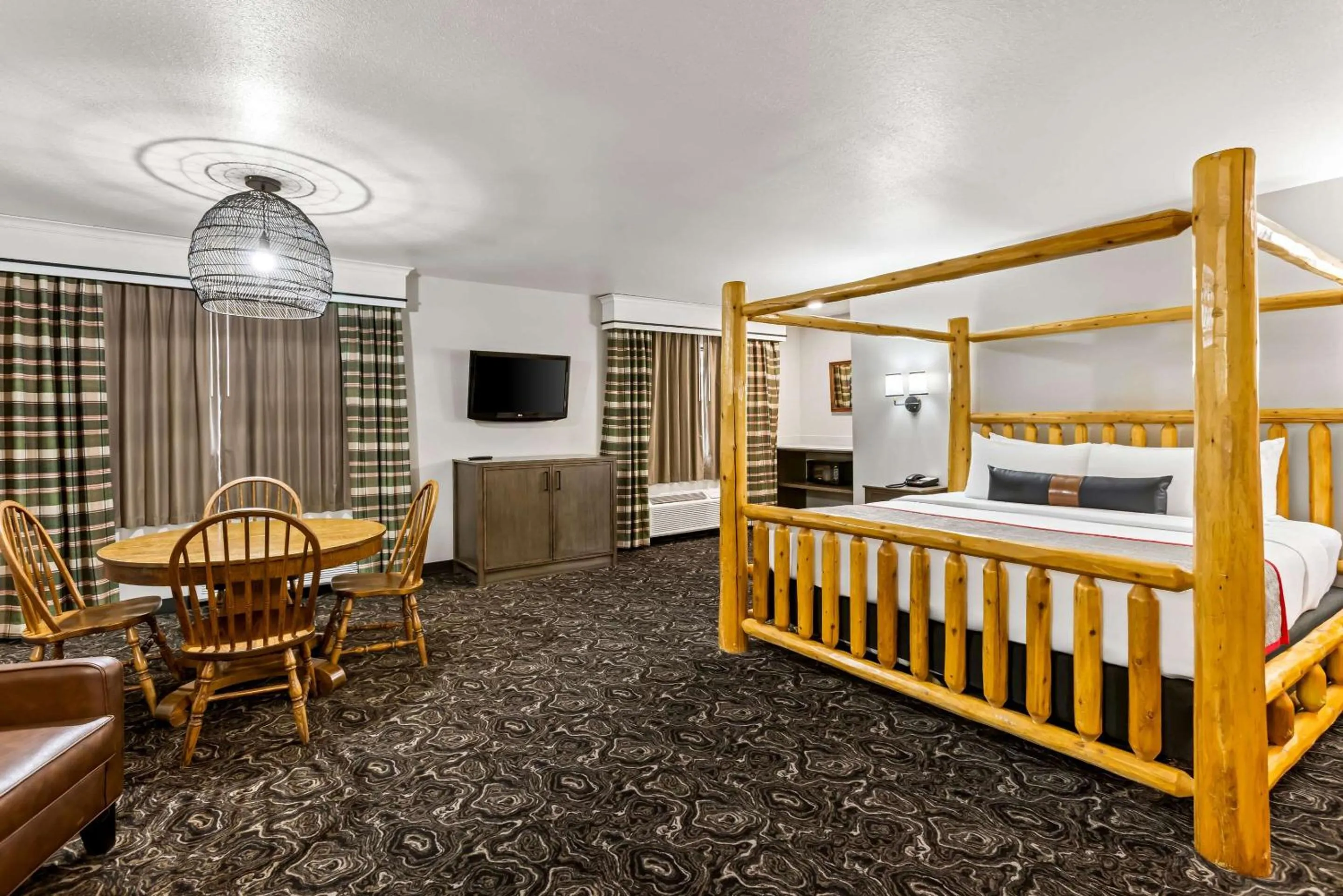 Bedroom in Lumber Jack Lodge, Ascend Hotel Collection