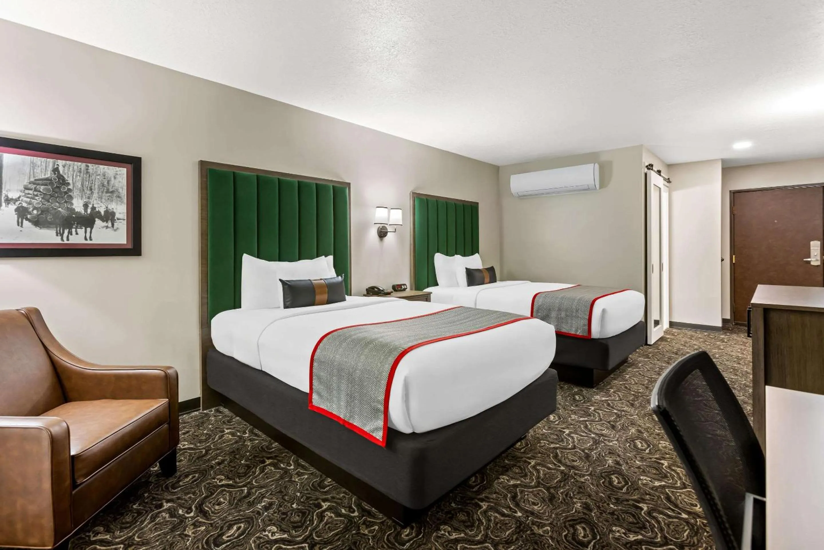 Bedroom in Lumber Jack Lodge, Ascend Hotel Collection