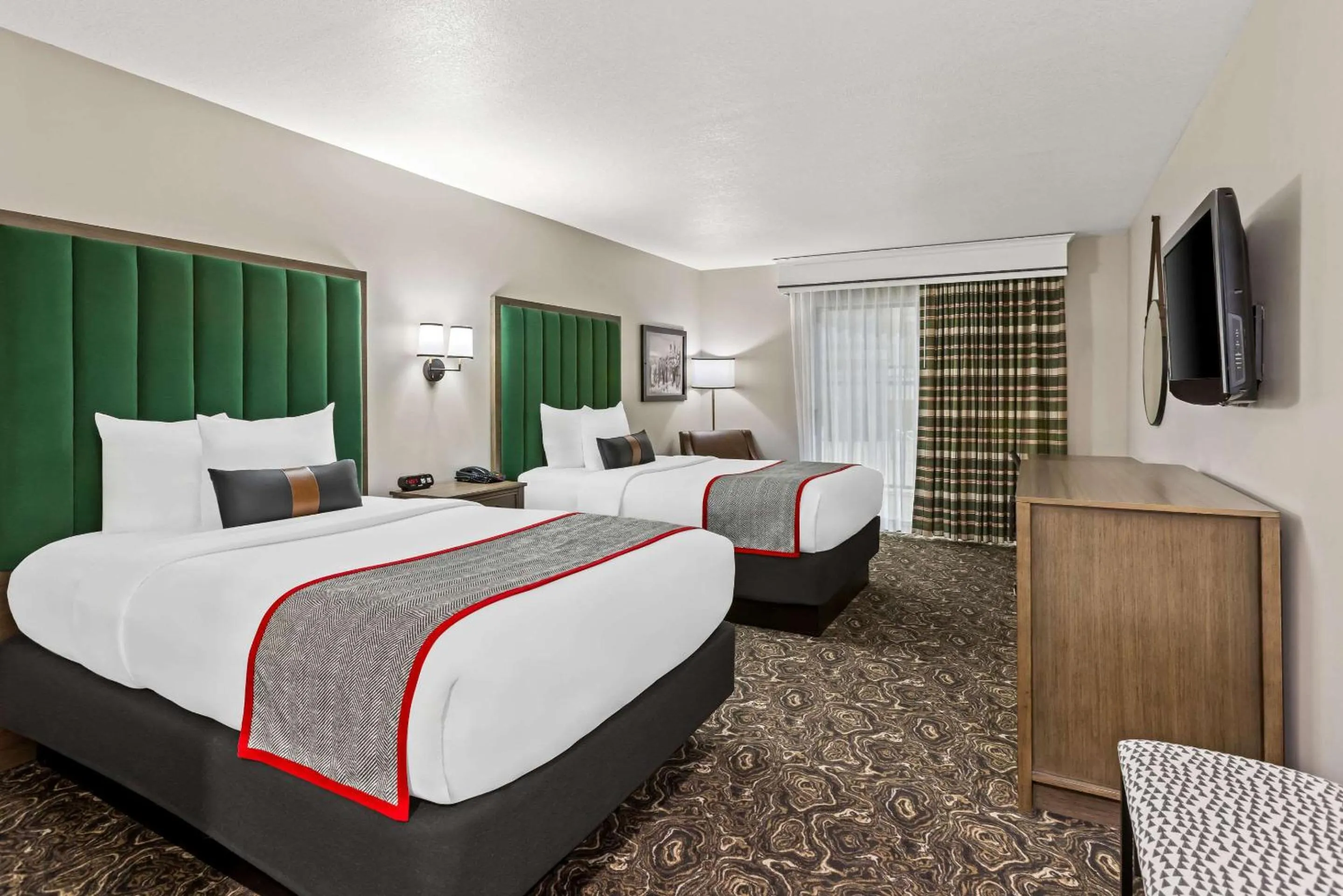 Bedroom in Lumber Jack Lodge, Ascend Hotel Collection