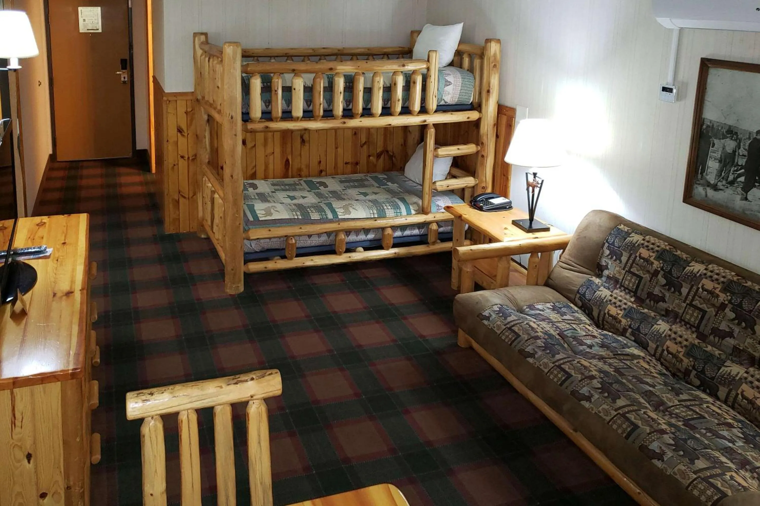 Bedroom in Lumber Jack Lodge, Ascend Hotel Collection