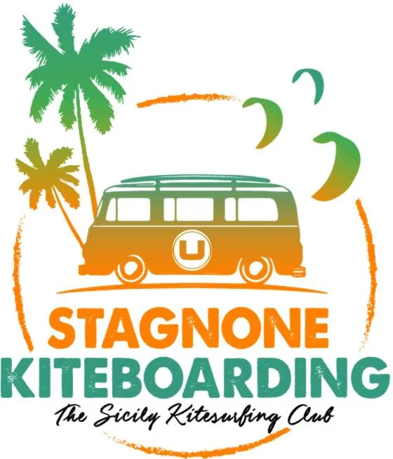 Windsurfing in Sunset Wave - STAGNONE KITESURF VILLAGE