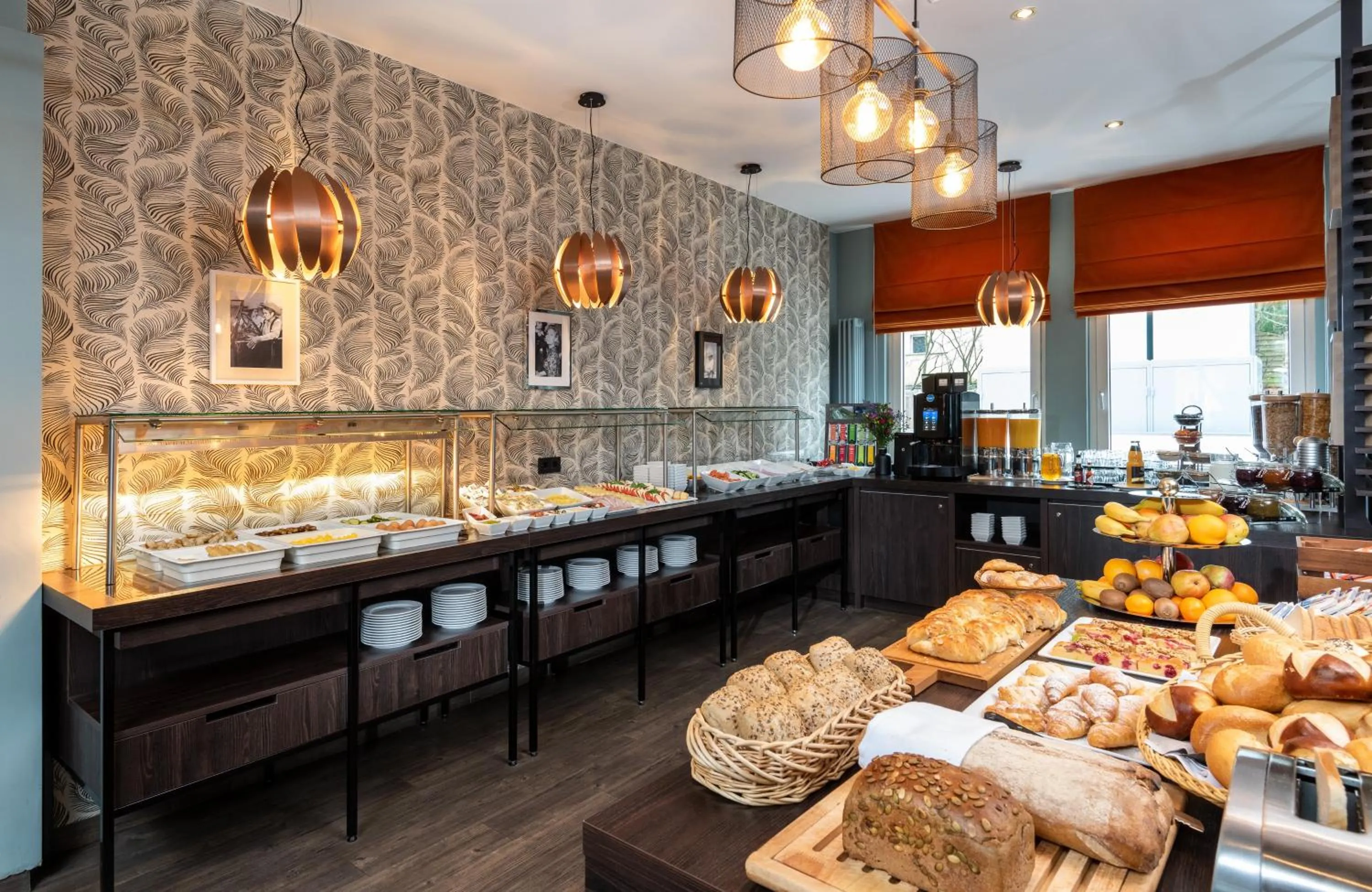Buffet breakfast in Leonardo Boutique Hotel Berlin City South